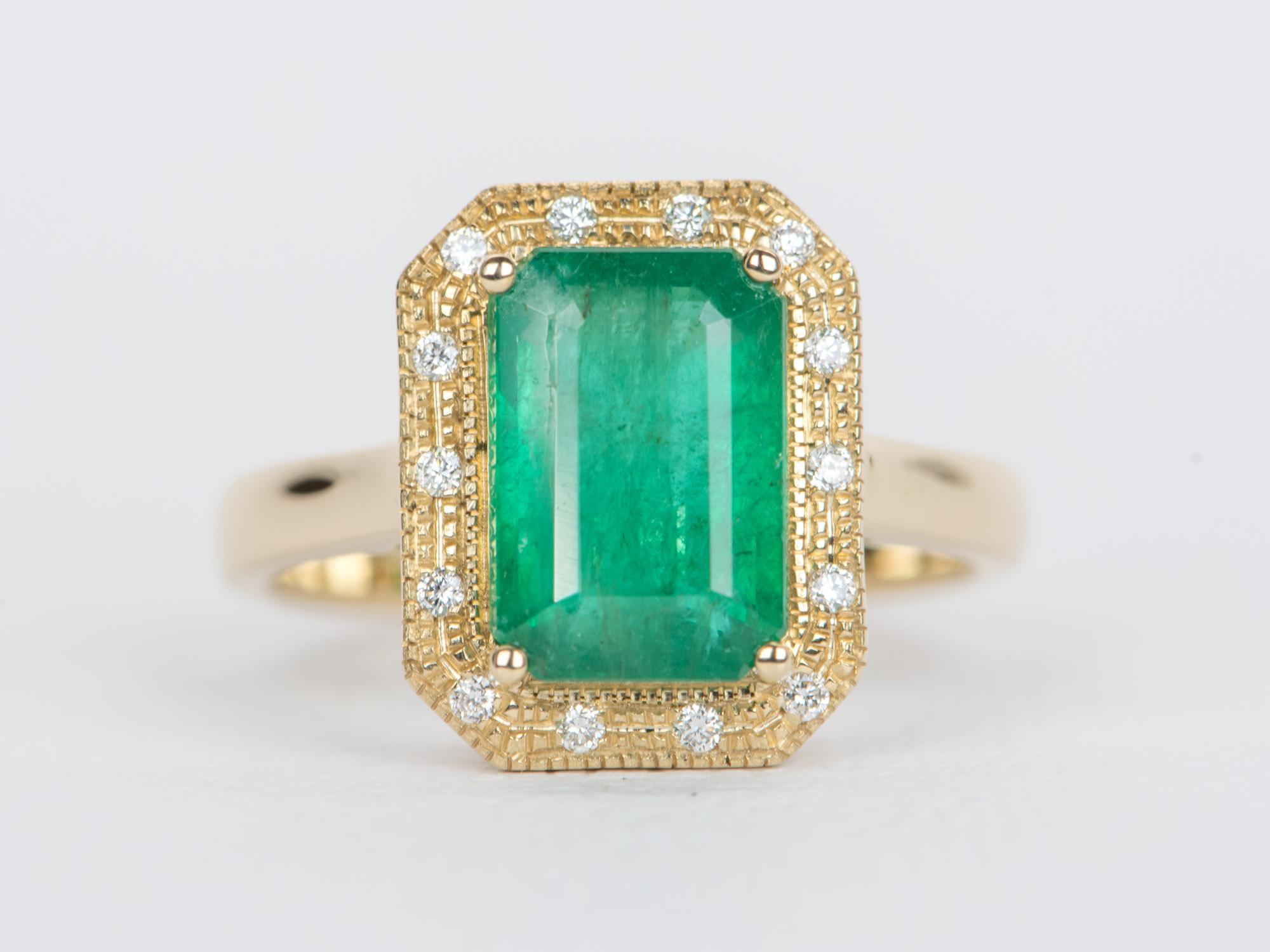 ♥ A solid 14K yellow gold ring set with a beautiful emerald in the center, accented with a beautiful diamond halo
♥ Gorgeous green color!
♥ The item measures 14.2mm in length, 11.2mm in width, and stands 6.5mm from the finger

♥ US Size 7 (Free