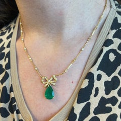 3.31ct Pear Emerald with Diamond Bow Necklace 18k Yellow Gold
