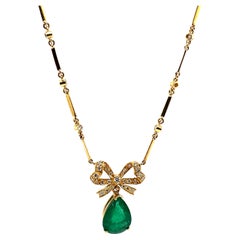 3.31ct Pear Emerald with Diamond Bow Necklace 18k Yellow Gold