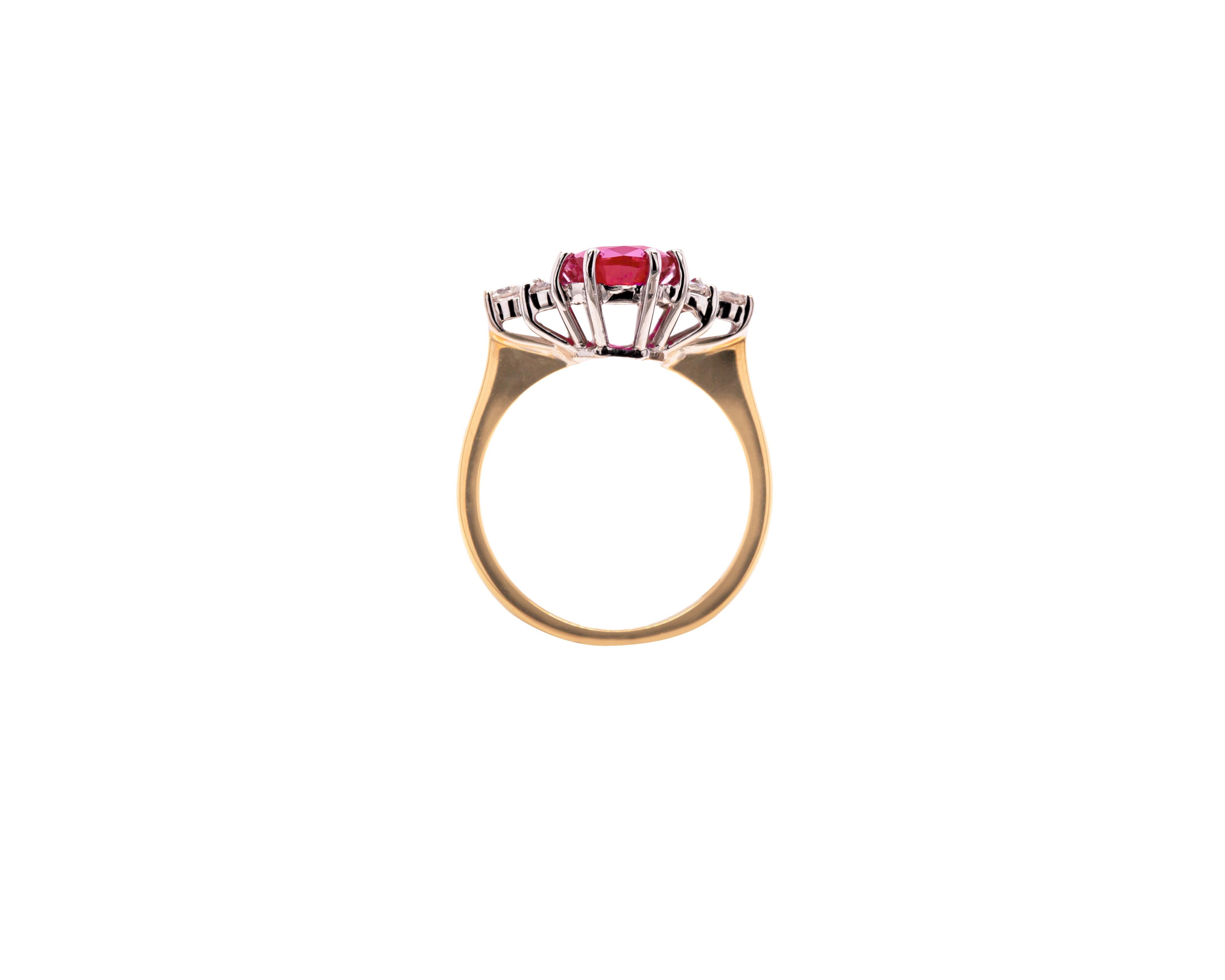 This gorgeous engagement ring is beautifully centered with 3.31ct vibrant red oval shaped ruby mounted in an eight claw, open back setting. The wonderful ruby is accompanied by 3 round brilliant cut diamonds on either side weighing approximately