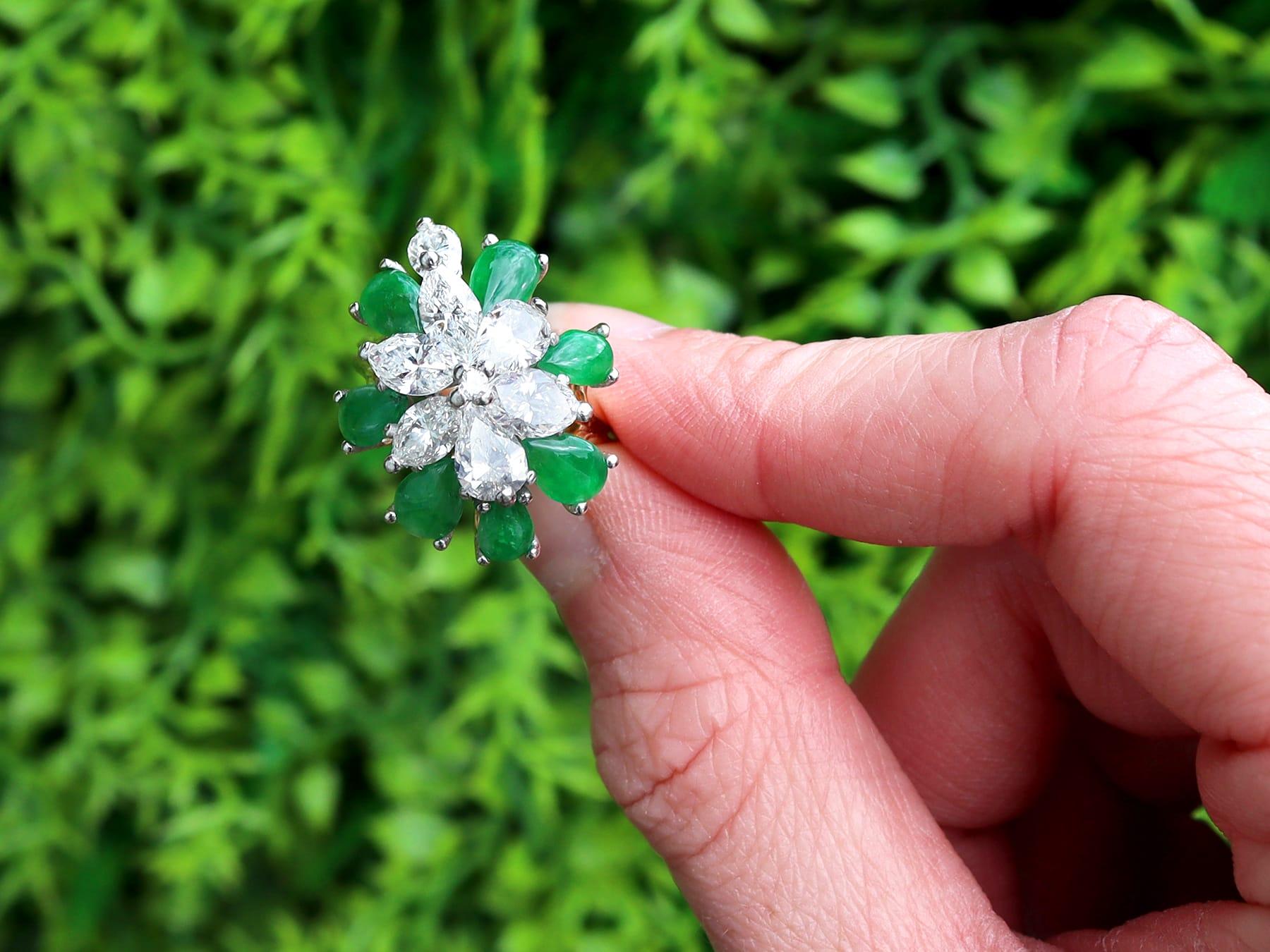 A stunning, fine and impressive vintage 3.32 carat jadeite and 4.10 carat diamond, 18 karat yellow gold and 18k white gold set floral cocktail ring; part of our diverse vintage ring collection.

This stunning vintage jade cocktail ring has been