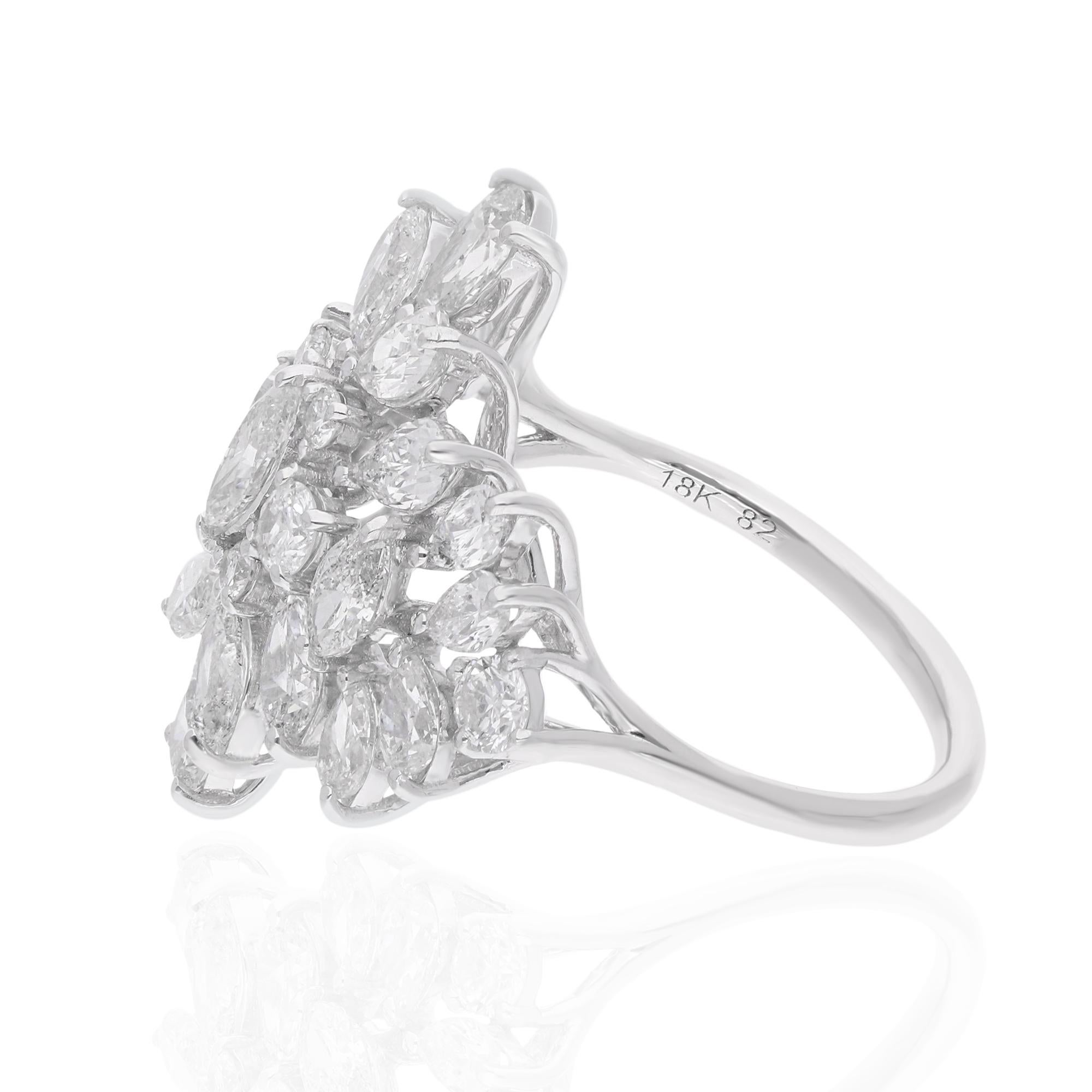 The centerpiece of this ring is the striking marquise diamond, flanked by two pear-shaped diamonds on either side, creating a mesmerizing display of brilliance and glamour. Each diamond is meticulously selected for its exceptional quality and