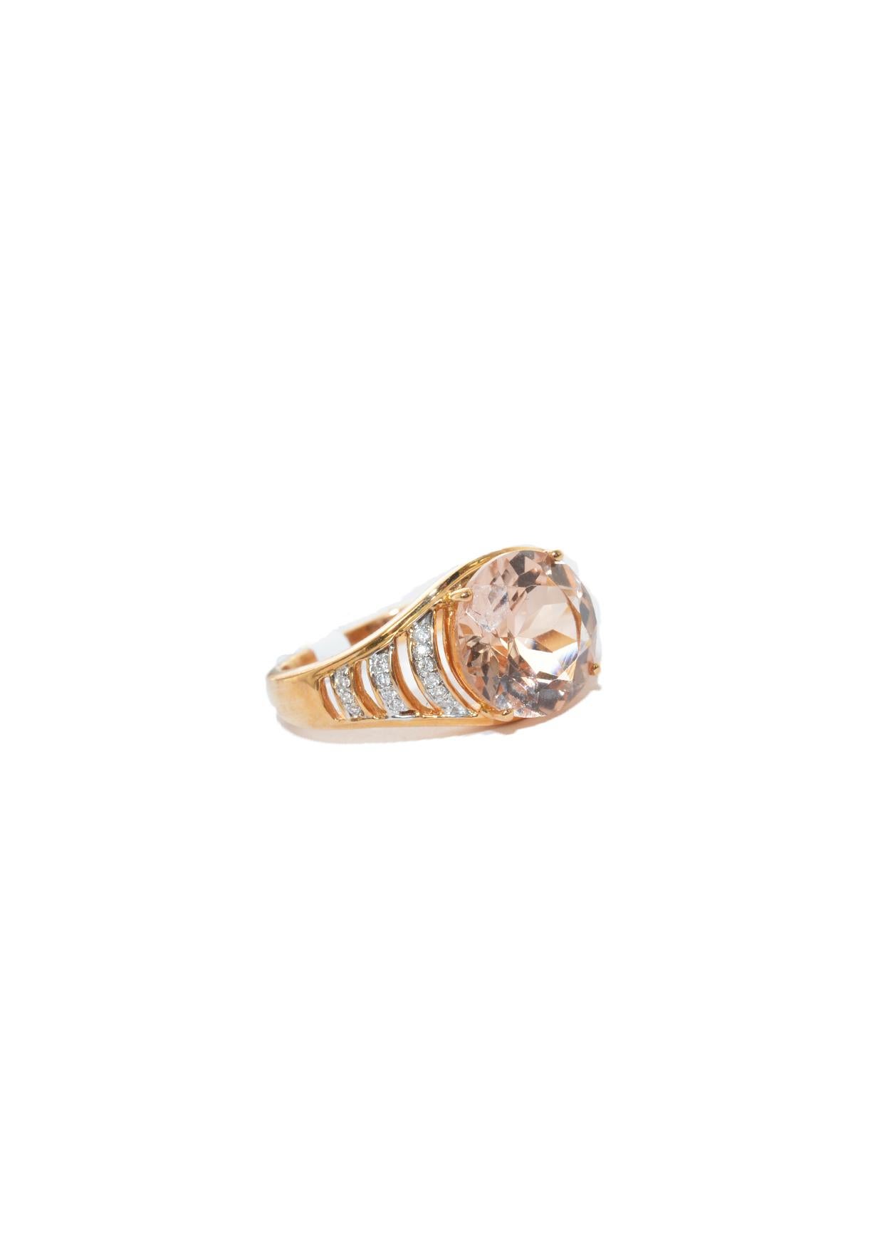 This collection features an array of magnificent morganites! Accented with Diamond these rings are made in rose gold and present a classic yet elegant look. 

Classic morganite ring in 18K Rose gold with Diamond. 

Morganite: 3.32 carat, 10.00mm