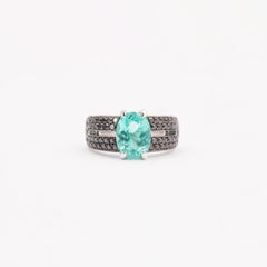 3.32 Carat Oval Paraiba Tourmaline Black Diamond Cocktail Ring