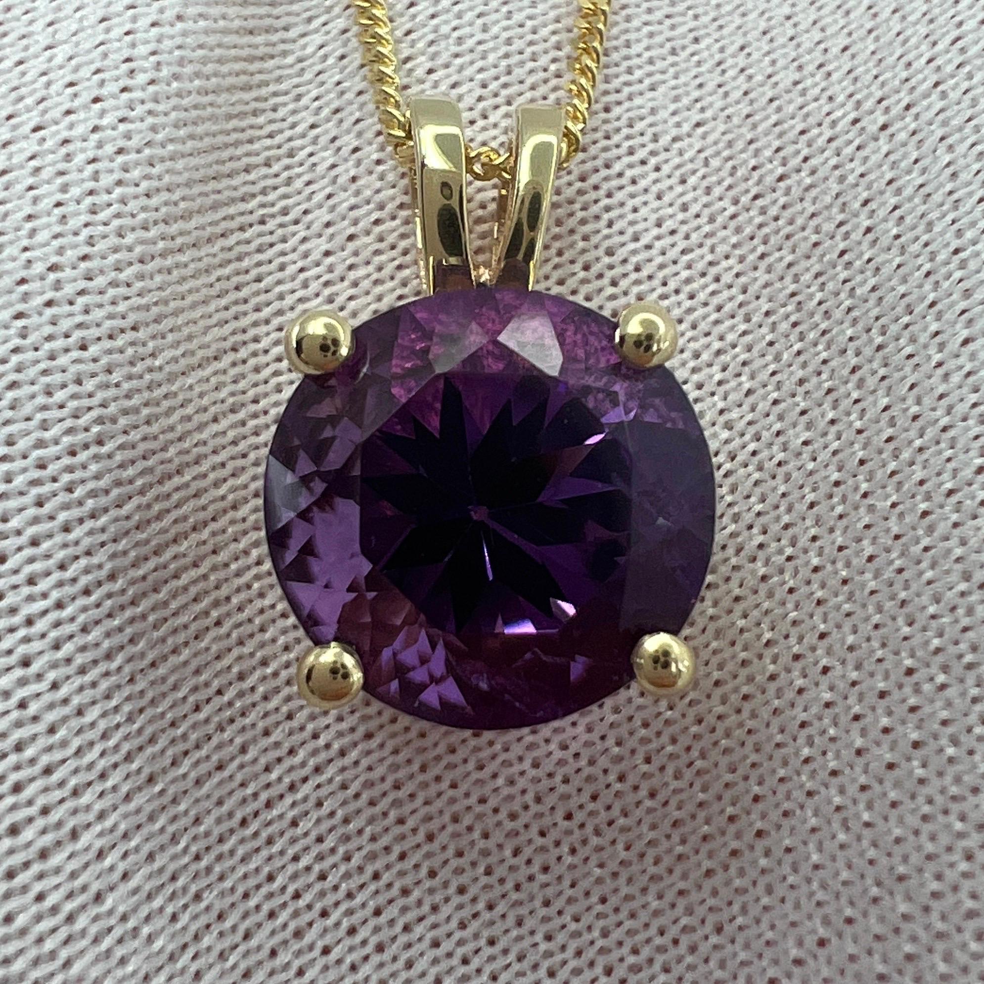 Vivid Purple Amethyst Round Brilliant Cut Yellow Gold Pendant Necklace.

Beautiful natural 3.32 carat amethyst set in a fine 9k yellow gold solitaire pendant.

This stone has an excellent round brilliant cut and excellent clarity. Fine amethyst