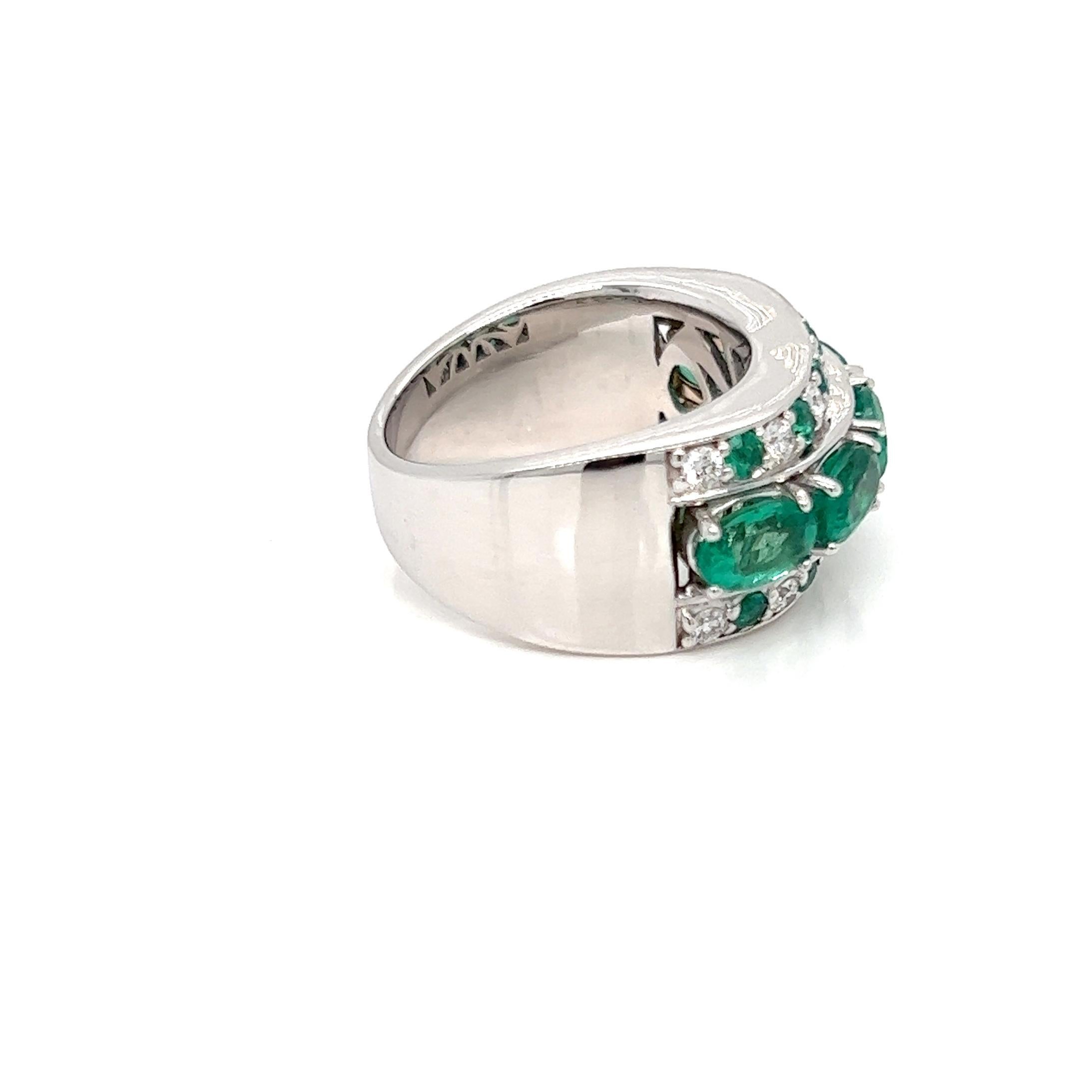 Oval Cut 3.32 Carats Emerald and Diamond Ring in White Gold For Sale