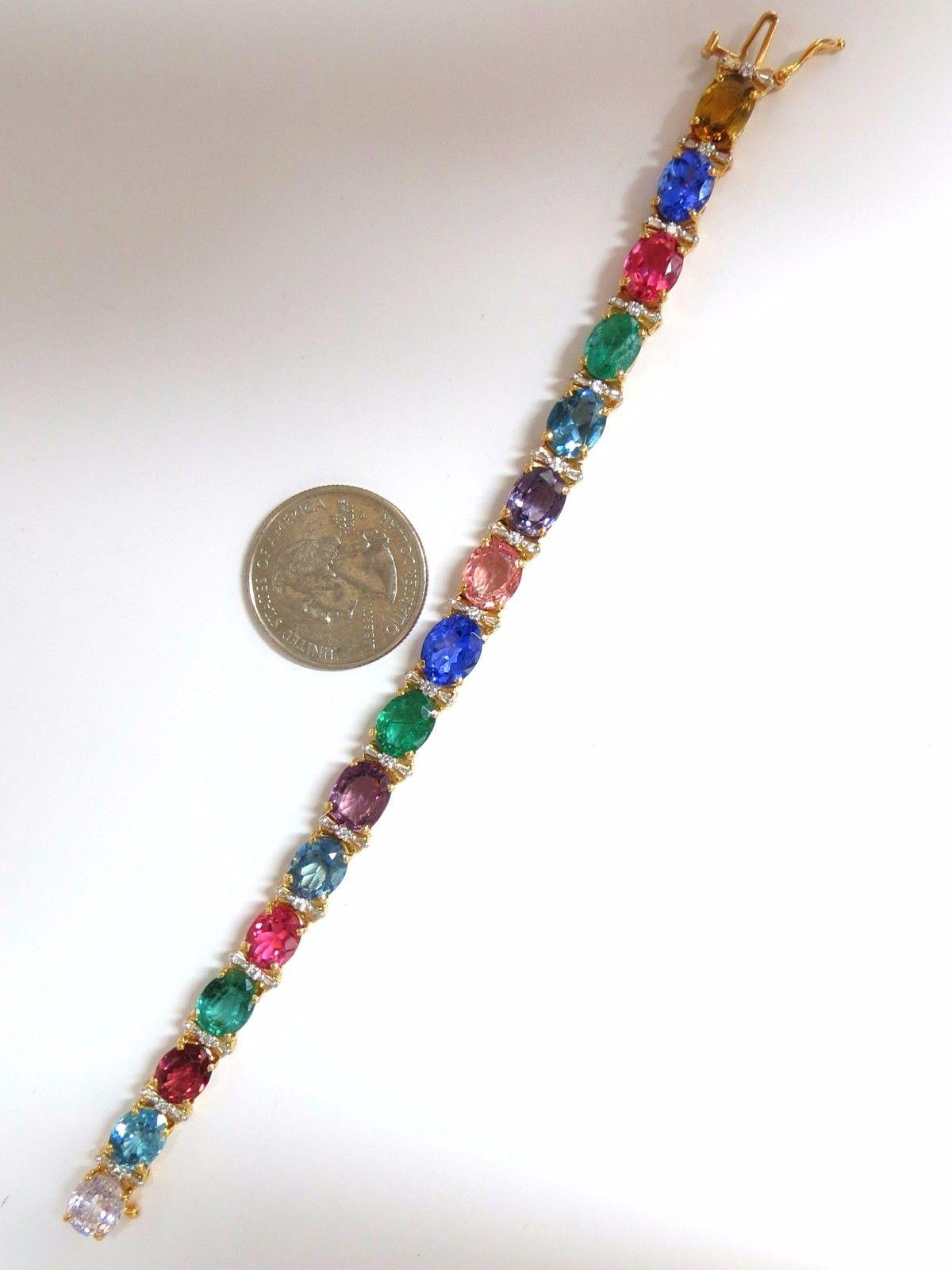 Color Palette.

33.21ct. Natural Sapphires, Garnets, Emeralds,

Spinel, Pink Tourmaline, Blue Zircon, Aquamarines,

 & .50ct Diamonds bracelet.

Full oval cuts, great sparkle.

Vibrant Greens, Orange, Reds, yellows, Blues and Pinks

Clean - Semi