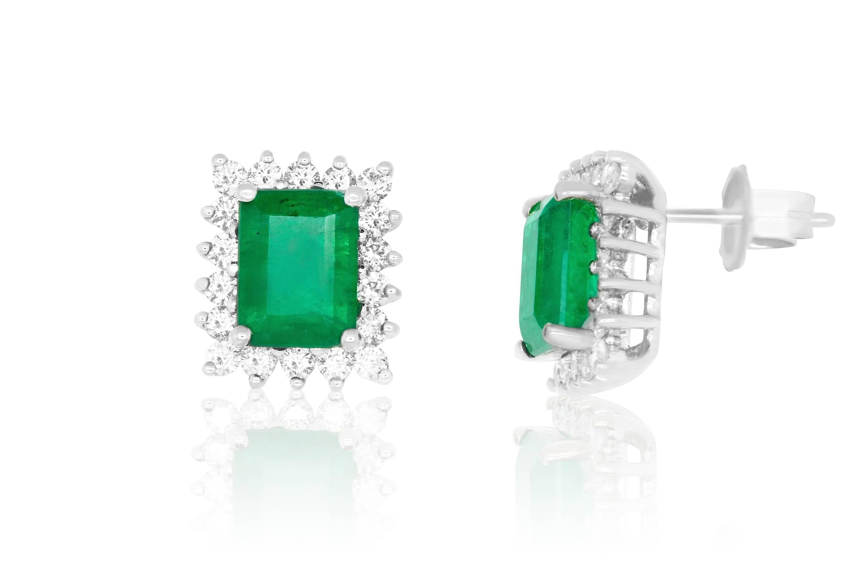 We were astonished to find a pair of Emerald Cut Emeralds so perfectly matched in quality, color, and size, we just had to turn them into earrings! 

Material: 14k White Gold 
Stone Details: 2 Emerald Cut Emeralds at 3.33 Carats Total Weight -