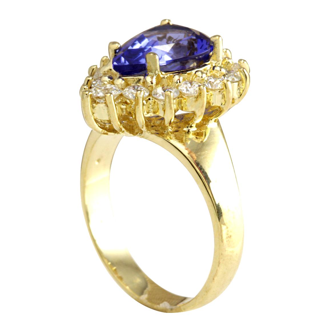 Pear Cut Tanzanite Diamond Ring In 14 Karat Yellow Gold  For Sale