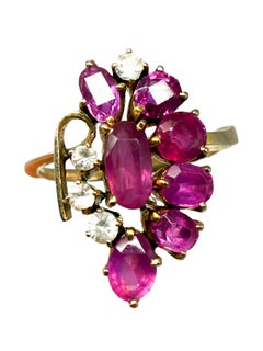 333 yellow gold ring with rubies and diamonds