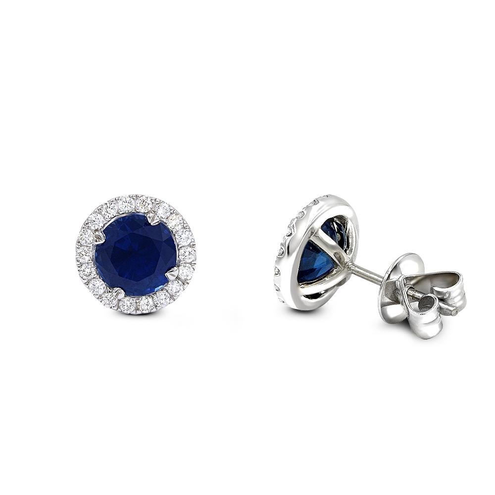 Magnificent diamond sapphire stud earrings. 
Crafted in 14k white gold.
3.34ct blue sapphires .47ct diamonds handset in prong setting.
Diamonds are VS2 clarity G color .
The earrings have secure push backs.
