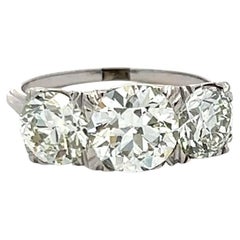 3.34 Carat Circular Brilliant Cut K-J SI1-VVS2 Diamond Platinum Three-Stone Ring