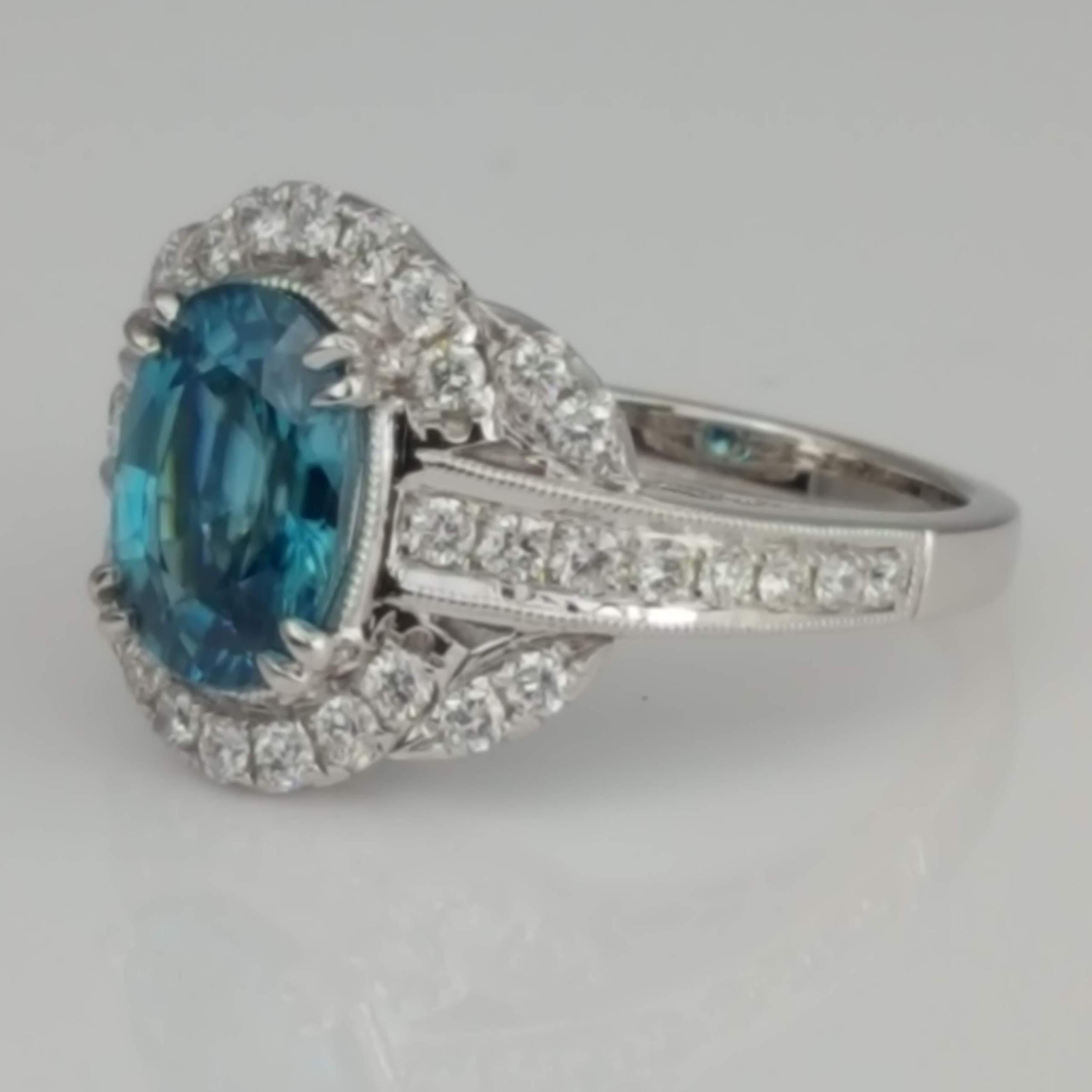 DiamondTown 3.34 Carat Oval Cut Blue Zircon and Diamond Halo Ring In New Condition In New York, NY