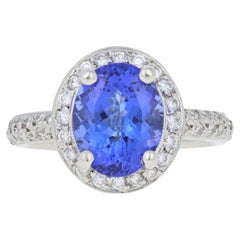 3.34 Carat Oval Cut Tanzanite and Diamond Ring, Platinum Milgrain Halo