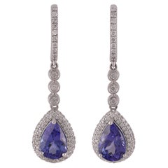 Boucle d'oreille Tanzanite 3.34 carats et diamants ronds 