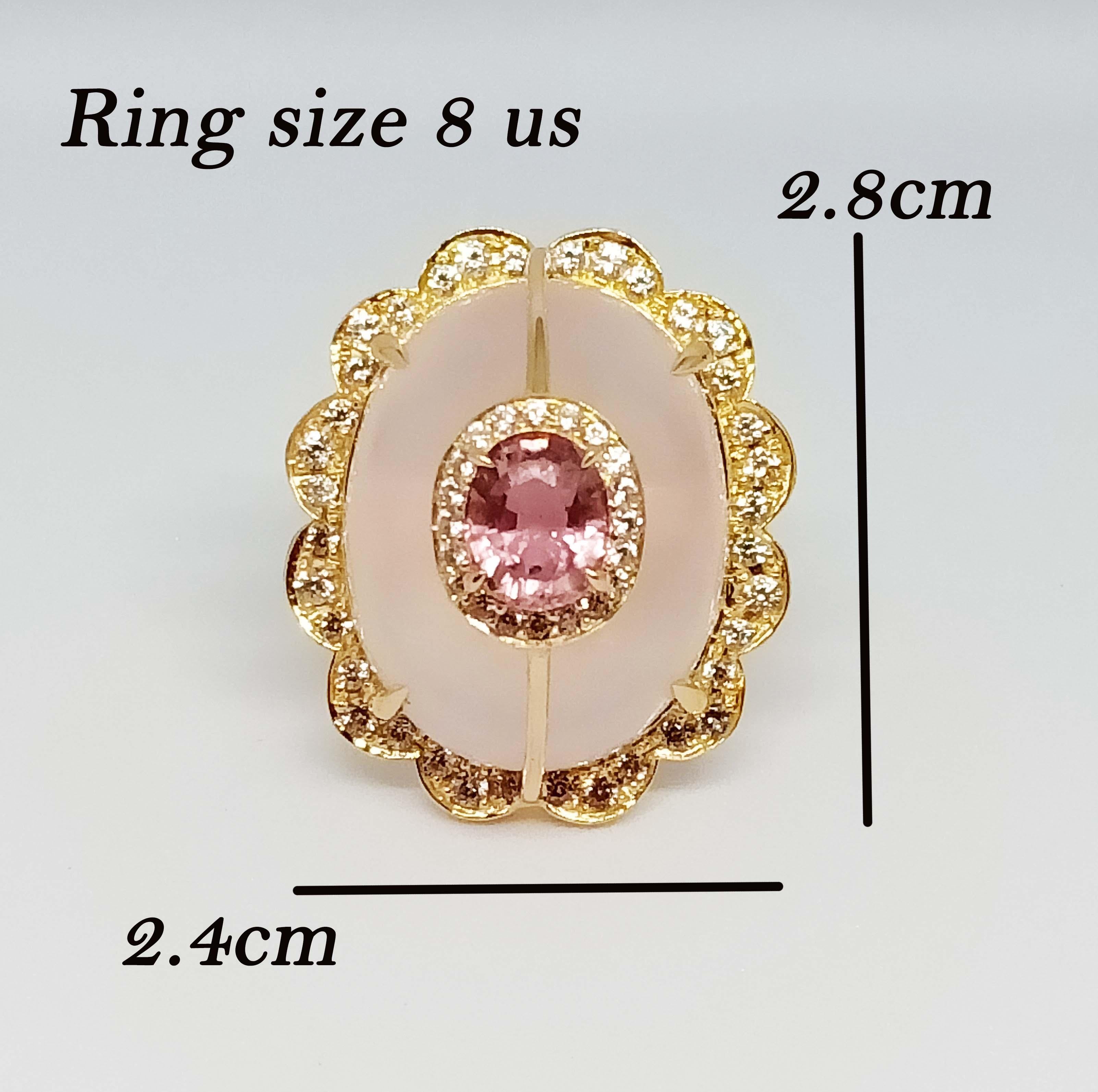 Rose Quartz  Cabochon  Oval 23x18x H12.5 mm. 33.43 cts.
Pink tourmaline Oval 7.7x6.3 mm. 1.83cts.
White Zircon 1.8 mm. 12 pcs. 
White Zircon 1.5 mm. 24 pcs.
White Zircon 1.25 mm. 18 pcs.

Sterling Silver on 18K Gold Plated.

Ring : Size 8 us.
