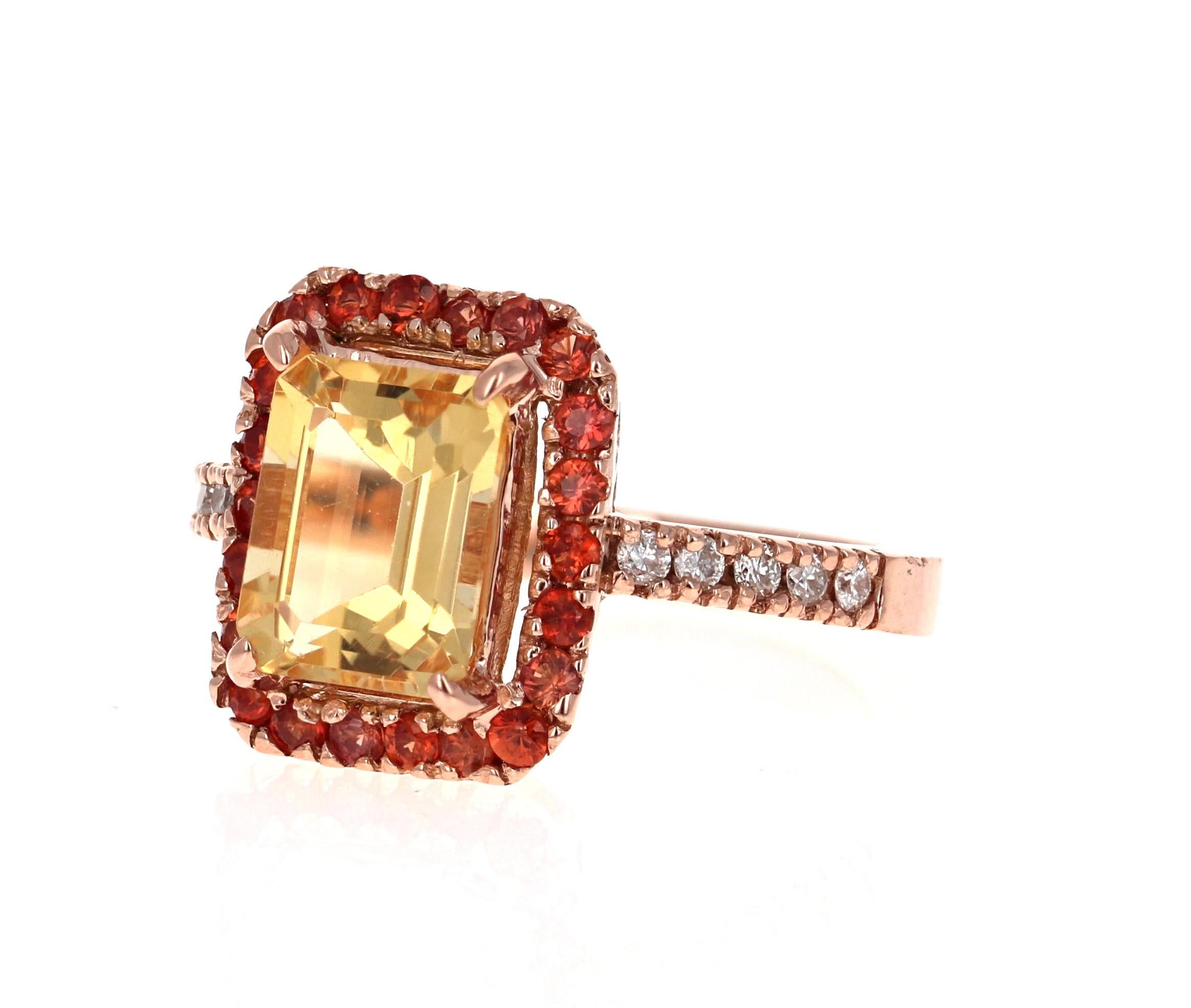 This gorgeous ring has a beautiful Emerald Cut Citrine Quartz weighing 2.51 Carats and is surrounded by a Halo of 22 Round Cut Orange Sapphires weighing 0.67 Carats.  Along the shank of the ring are 10 Round Cut Diamonds that weigh 0.17 Carats