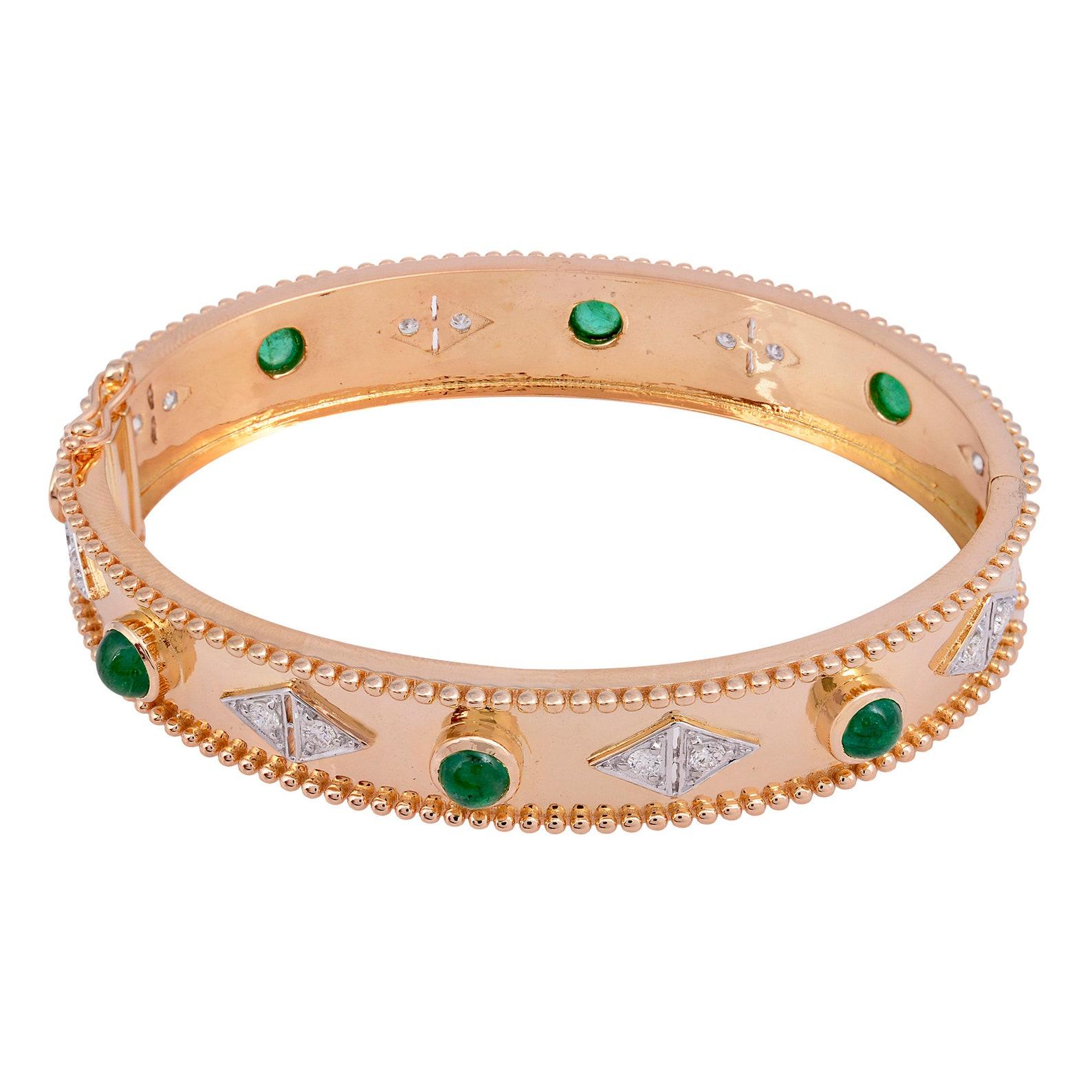 A stunning bracelet handmade in 14K gold.  It is set in 3.35 carats emerald and .80 carats of sparkling diamonds.  Clasp Closure.

FOLLOW  MEGHNA JEWELS storefront to view the latest collection & exclusive pieces.  Meghna Jewels is proudly rated as
