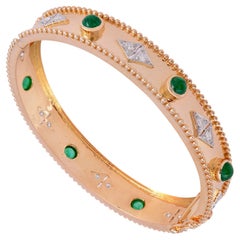 Bracelet jonc cerf-volant en or 14 carats avec diamants et émeraudes de 3,35 carats