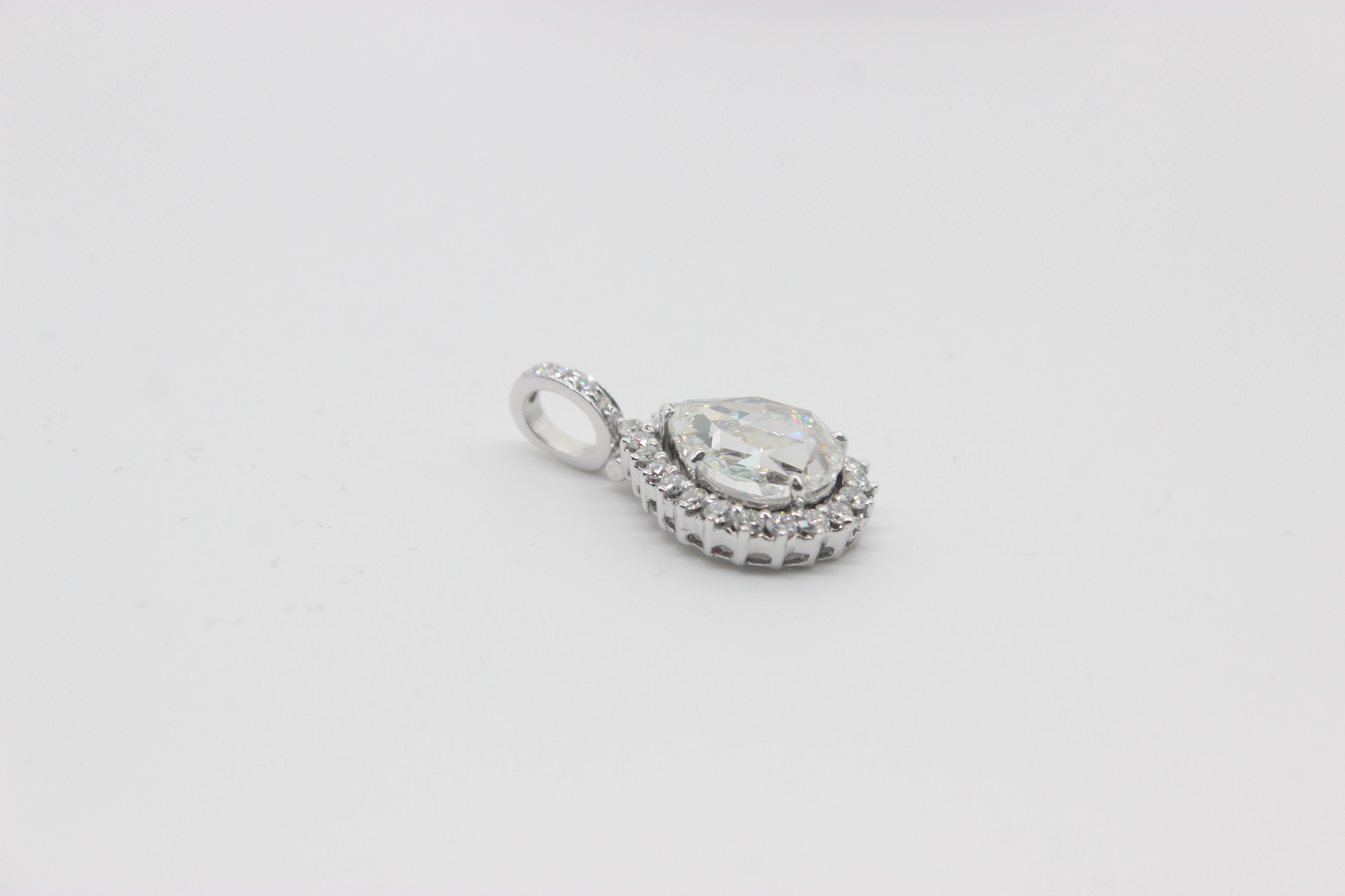 PANIM 3.35 Carat Rosecut Diamond 18k White Gold Pendant

Subtle but attractive ,This Panim rosecut pendant is a timeless piece of jewellery. It has a 3.35 ct. total weight of diamonds,having a 2.51 cts pear-shaped rosecut diamond center stone.