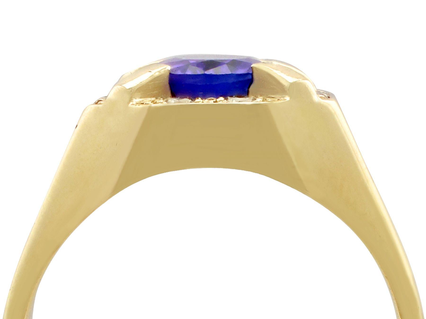A stunning, fine and impressive modern 3.35 carat natural tanzanite and 0.50 carat diamond, 18 karat yellow gold dress ring; part our contemporary jewellery collections.

This stunning, fine and impressive contemporary tanzanite and diamond ring has