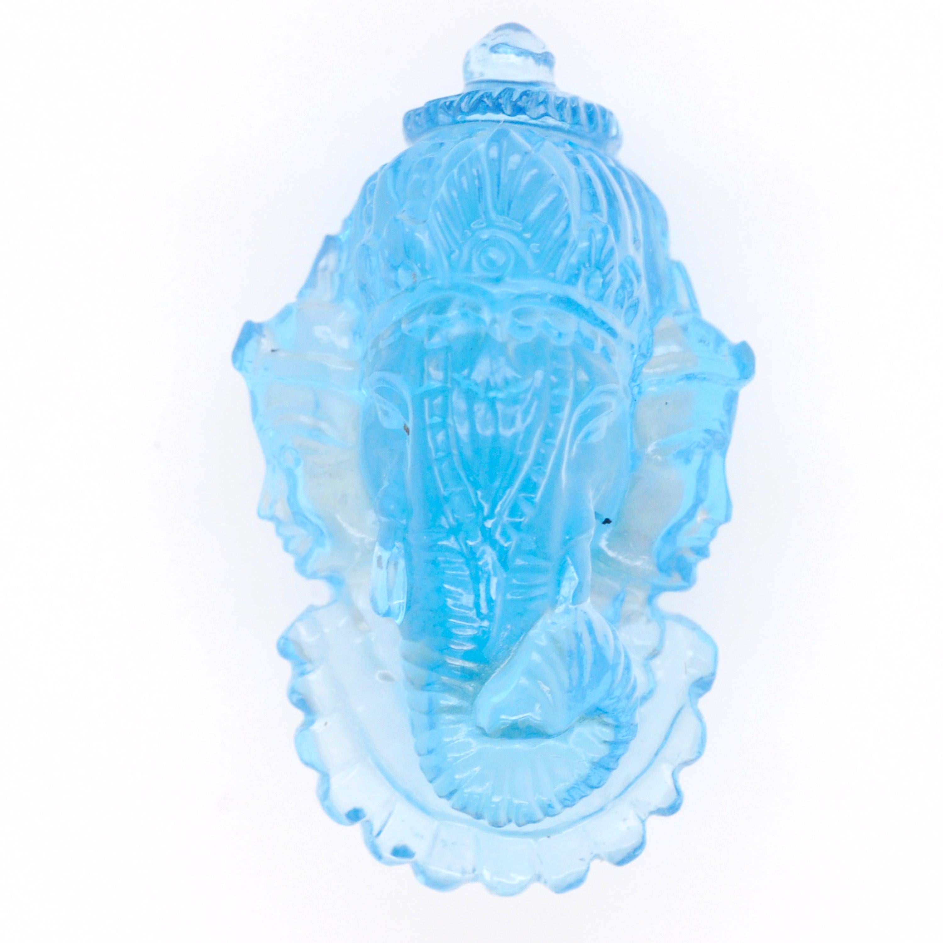 Women's or Men's 33.54 Carat Swiss Blue Topaz Ganesha Riddhi Siddhi Carving Loose Gemstone For Sale