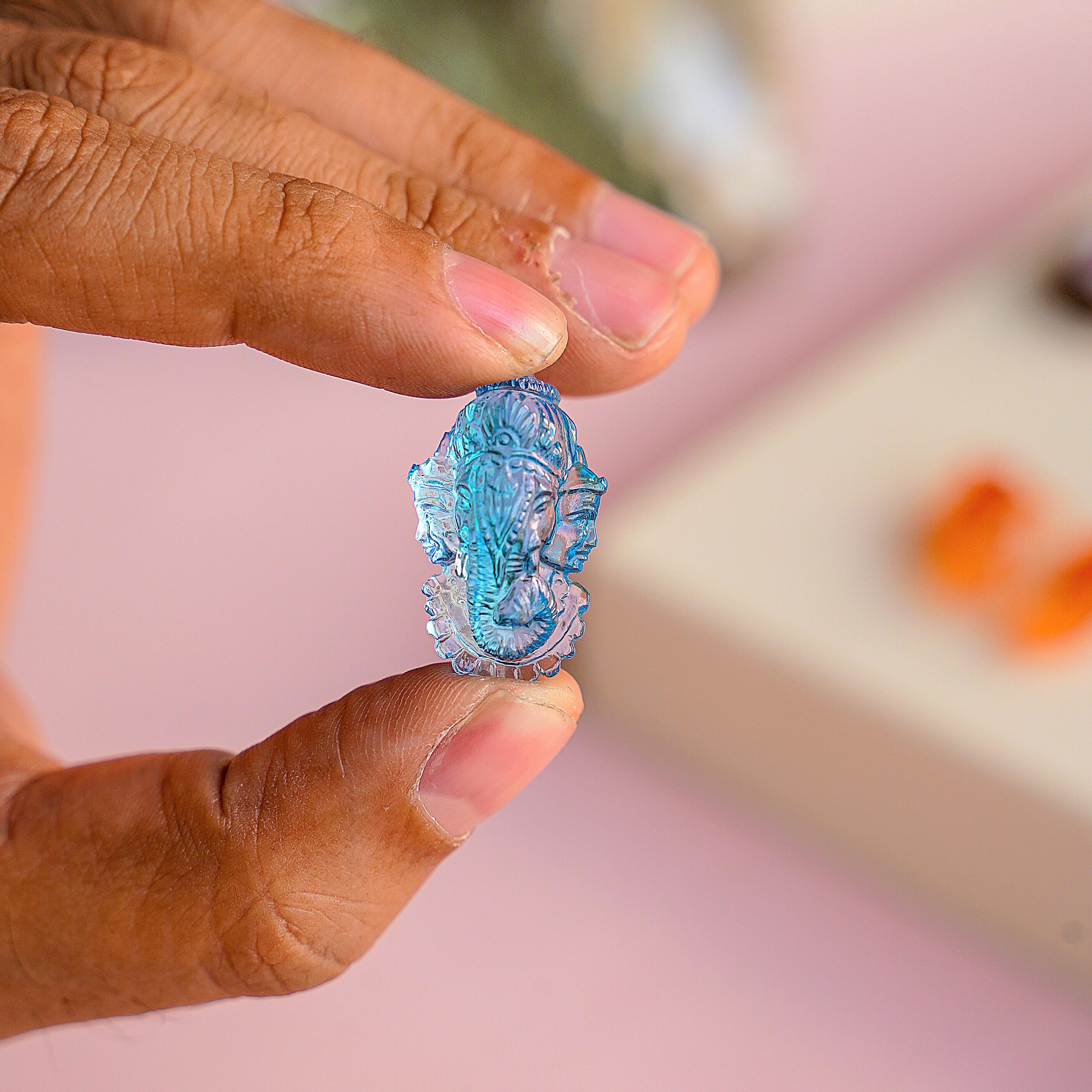 33.54 Carat Swiss Blue Topaz Ganesha Riddhi Siddhi Carving Loose Gemstone For Sale 1