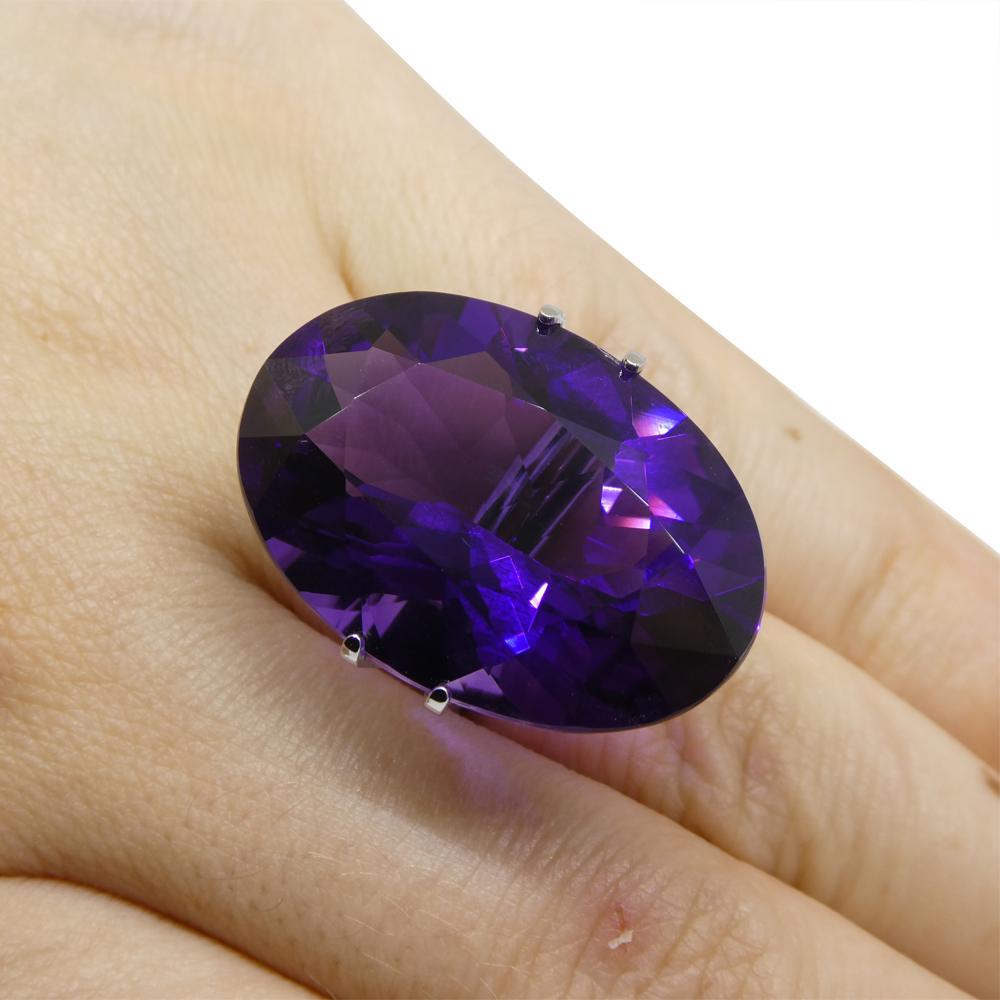 Description:

Gem Type: Amethyst
Number of Stones: 1
Weight: 33.57 cts
Measurements: 25.18 x 18.97 x 12.22 mm
Shape: Oval
Cutting Style:
Cutting Style Crown: Brilliant
Cutting Style Pavilion:
Transparency: Transparent
Clarity: Very Very Slightly