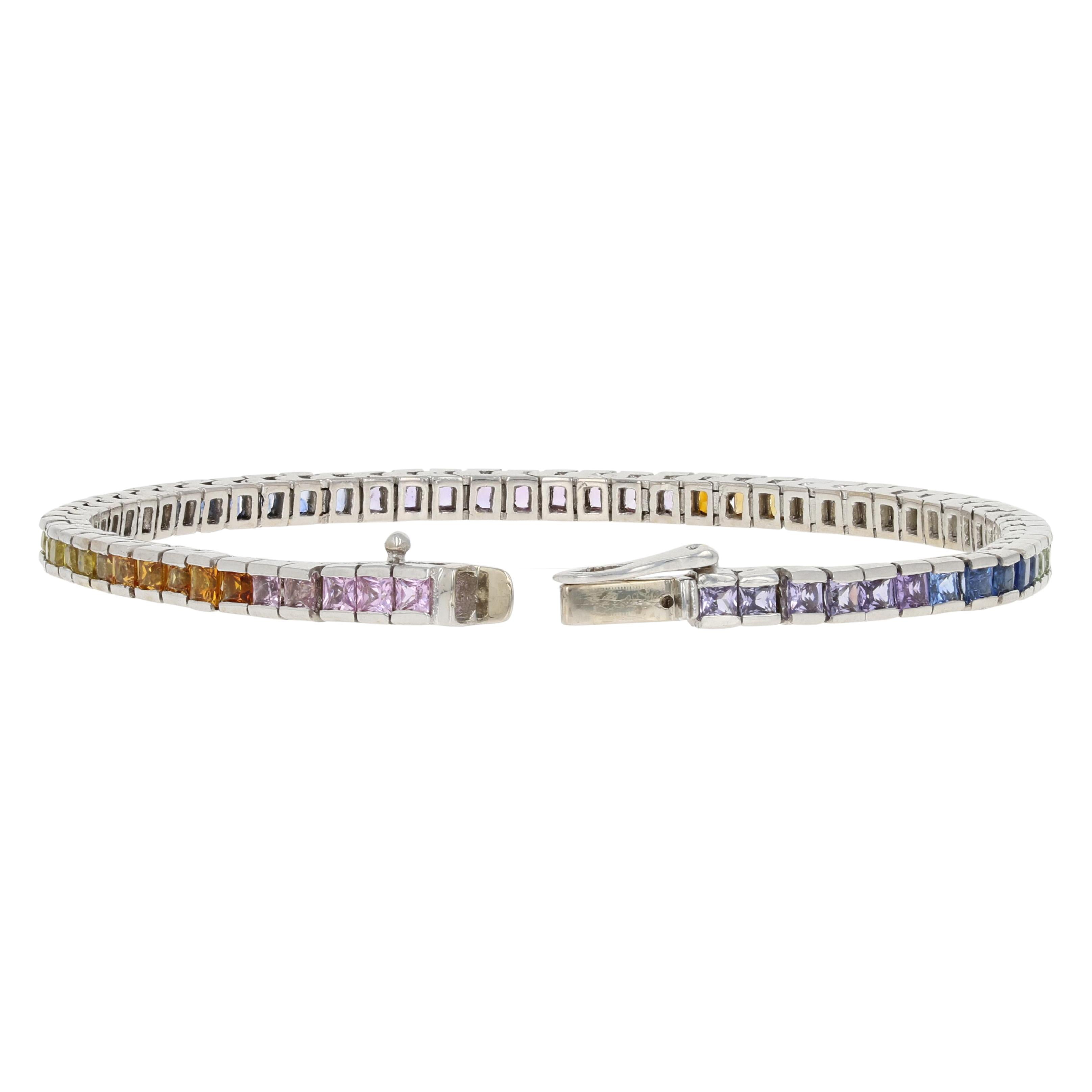 Invigorate your wardrobe with a kaleidoscope of color! Featuring a modern tennis design, this bracelet showcases radiant, multi-color sapphires set in glistening 14k white gold.  

Metal Content: Guaranteed 14k Gold as stamped

Stone
