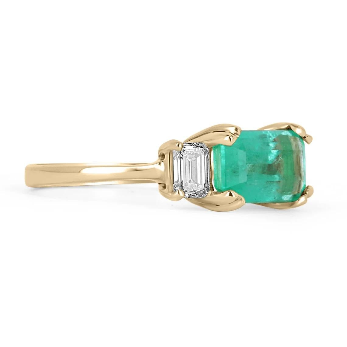 Featured is a magnificent, Colombian emerald and diamond ring. In the very center is a gorgeous, 2.71-carat elongated Colombian emerald-emerald cut, set east to west and displays a stunning, vivid green color, and excellent luster. Accented on the