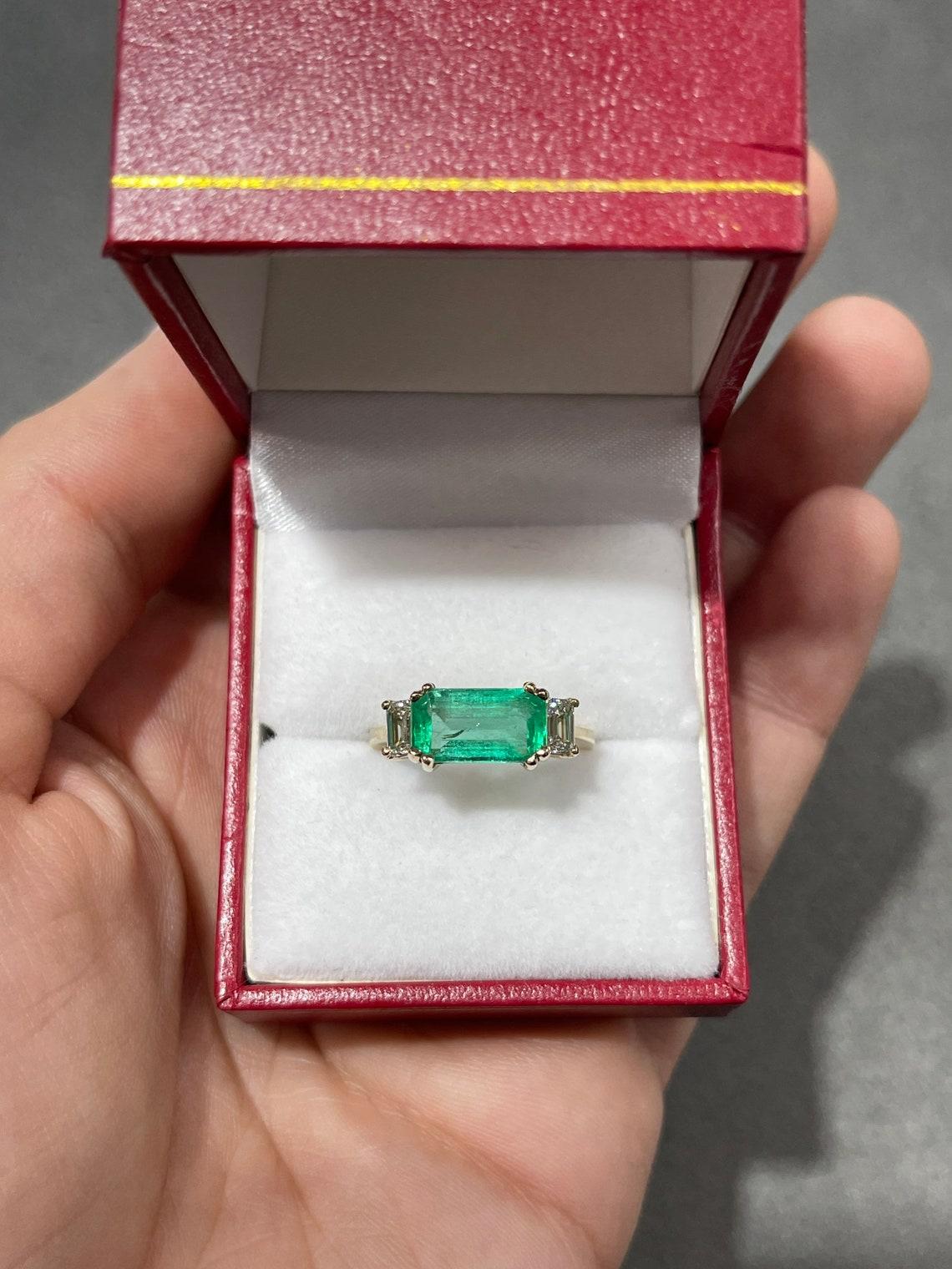 vintage emerald cut engagement rings