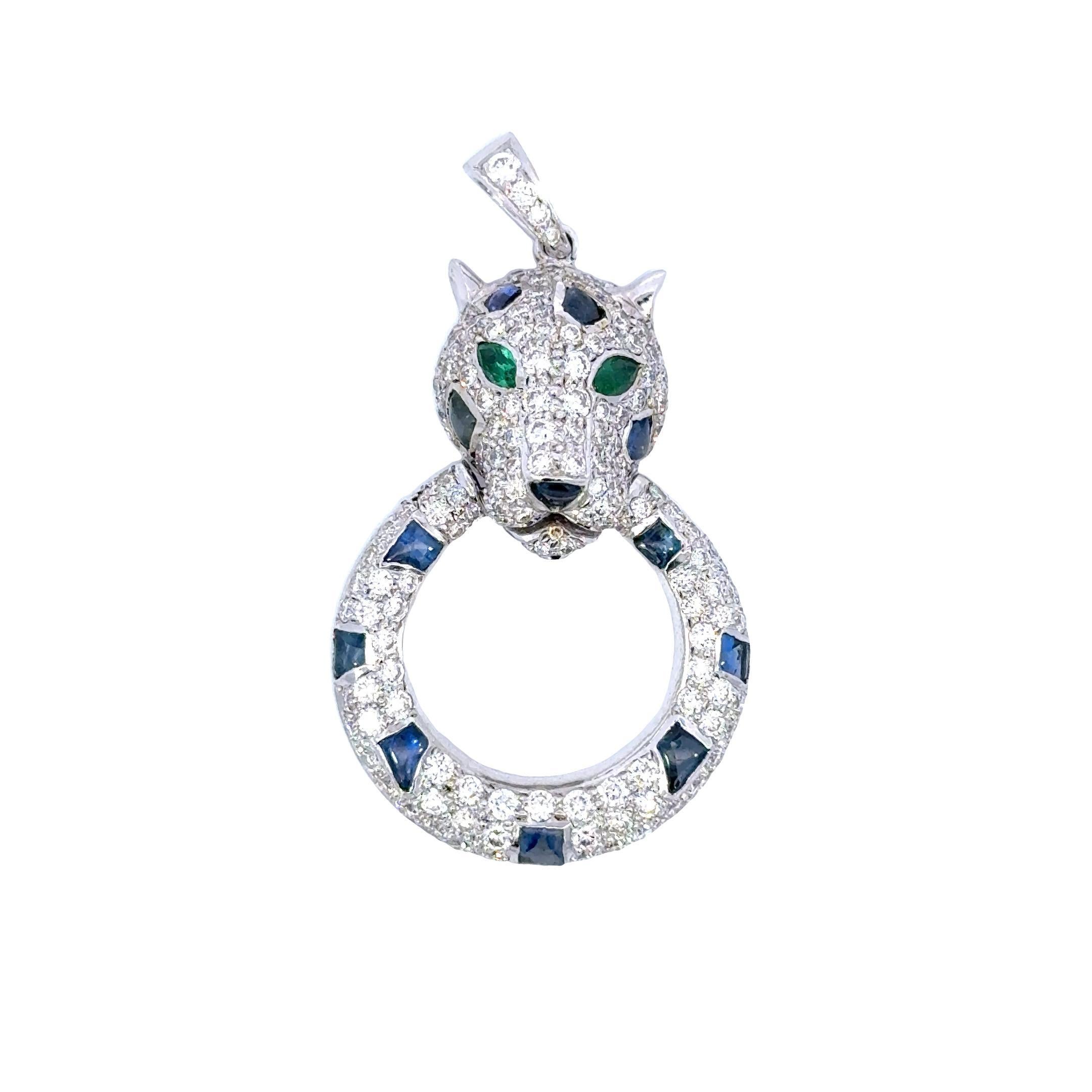 Unleash the allure of the wild with our Panther Sapphire and Emerald Pendant, a mesmerizing blend of opulence and ferocity. This extraordinary piece features a striking panther motif, meticulously crafted from 14K gold and weighing 9.76 grams,