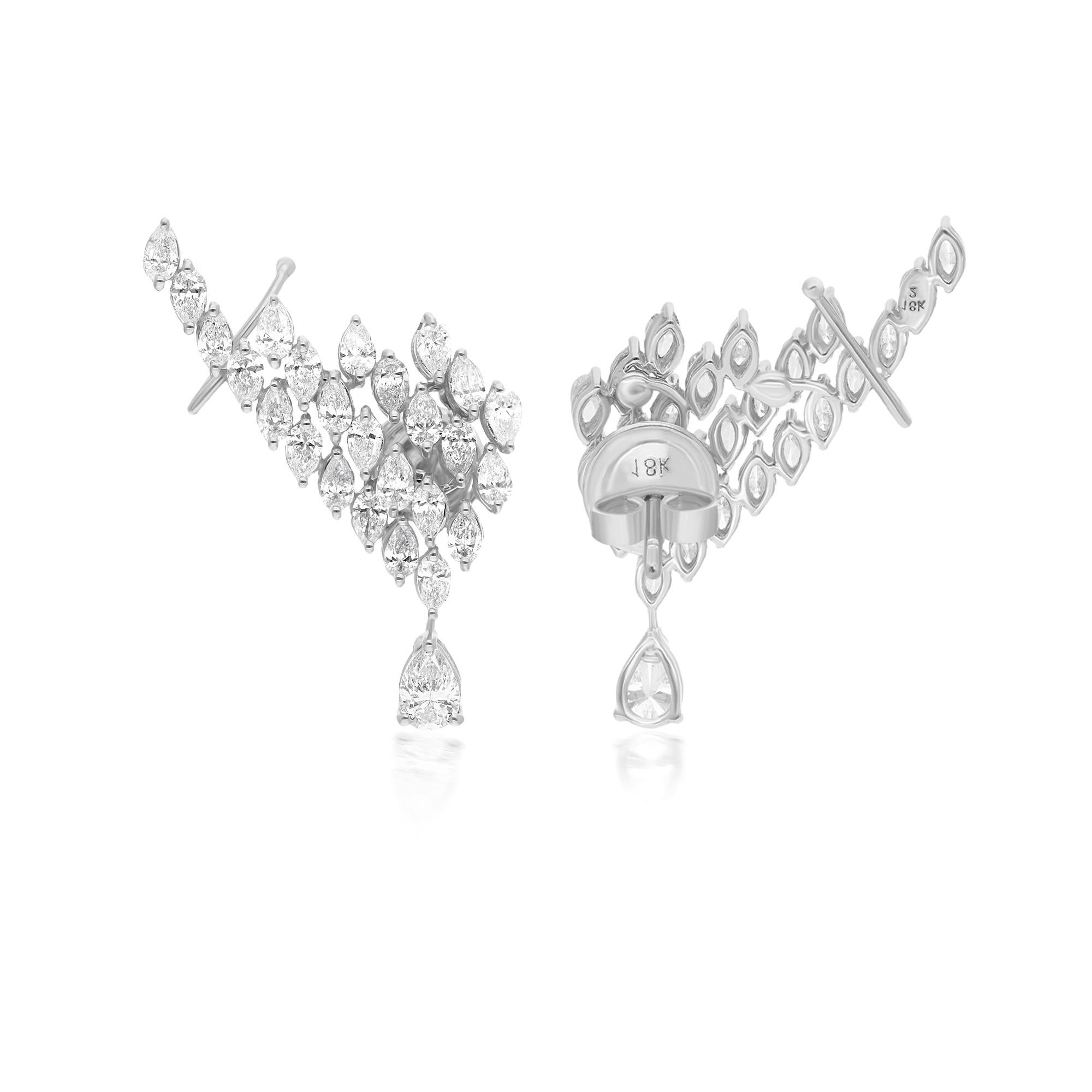 Indulge in the allure of timeless elegance with these enchanting 3.36 Carat Marquise & Pear Diamond Ear Cuff Earrings, a captivating display of sophistication meticulously crafted in luminous 14 Karat White Gold. These earrings redefine luxury with