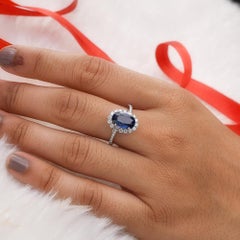 3.36 Carat Oval Blue Sapphire Diamond Halo Cocktail Ring 18 Karat White Gold