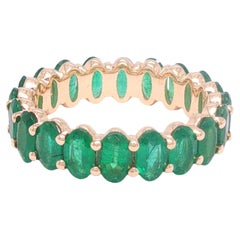 3.36 Carat Oval Emerald Eternity Ring in 14K Yellow Gold