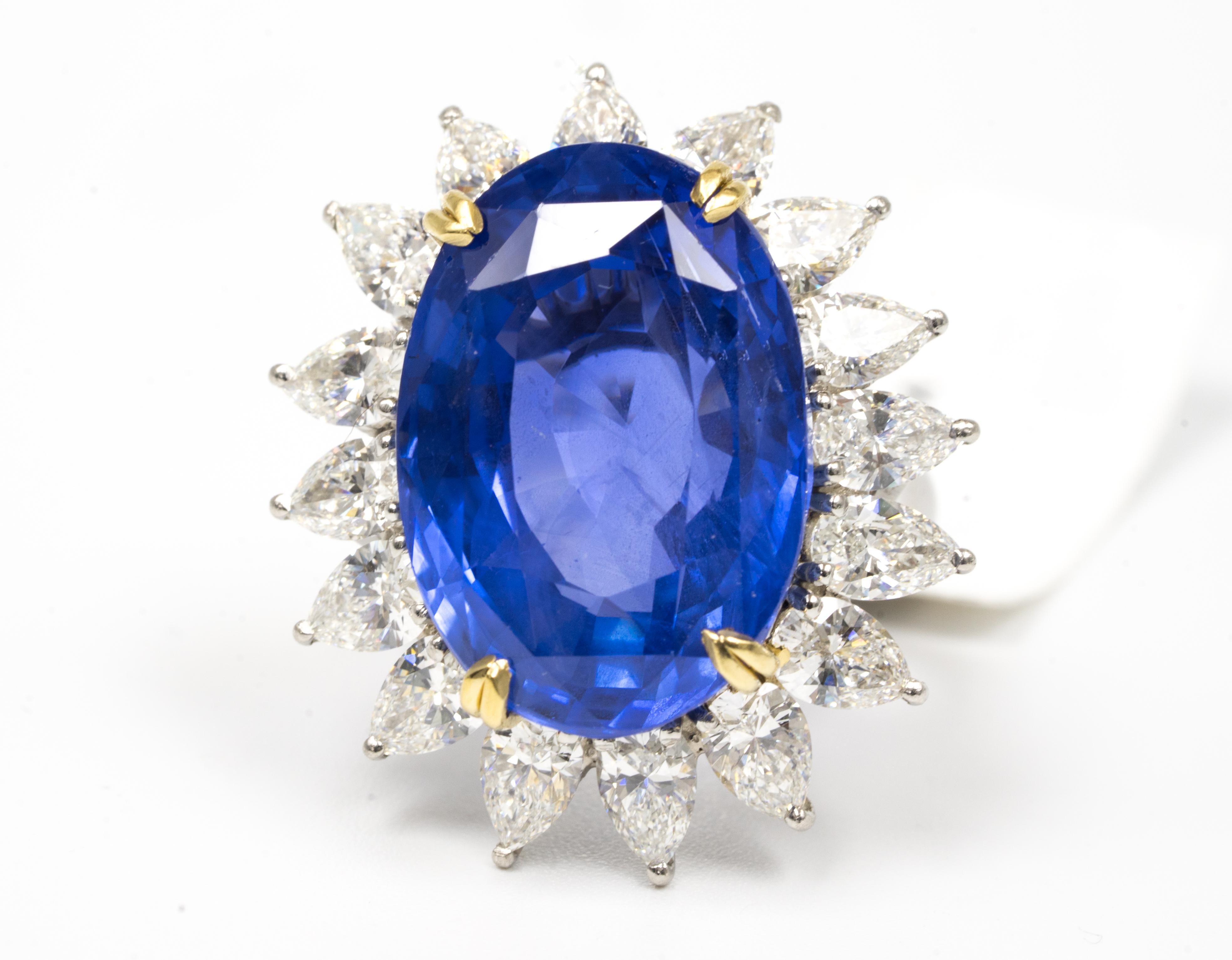 A Magnificent  33.64ct. Natural Unheated Sapphire and diamond ring in 18k Yellow Gold & Platinum, surrounded by 16 Pear shape diamonds with a total weight of approx 5.50 carats.  

Accompanying GIA Grading report number 1152924208.


