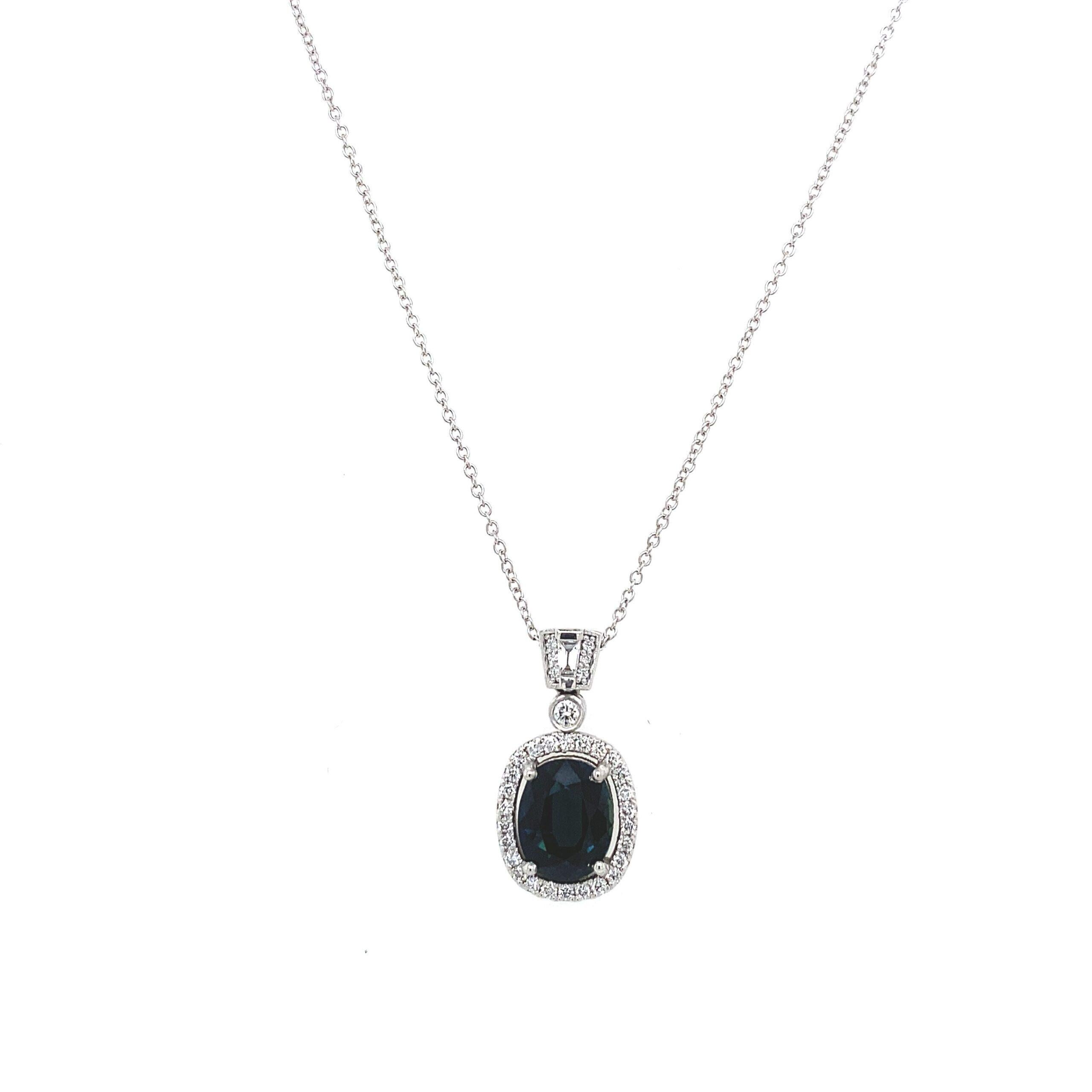3.36ct Finest Quality Oval Blue Sapphire Pendant, Set with 0.65ct Of Diamonds

Surrounded by 0.65ct Of Rounds Diamonds  & One Tapered Baguette. Suspended on 14'' Platinum Trace Chain.

Additional Information:
Diamond Weight: 0.65ct
Diamond Colour: