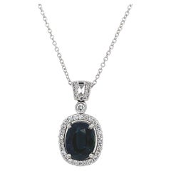 3.36ct Finest Quality Oval Blue Sapphire Pendant Set with 0.65ct of Diamonds