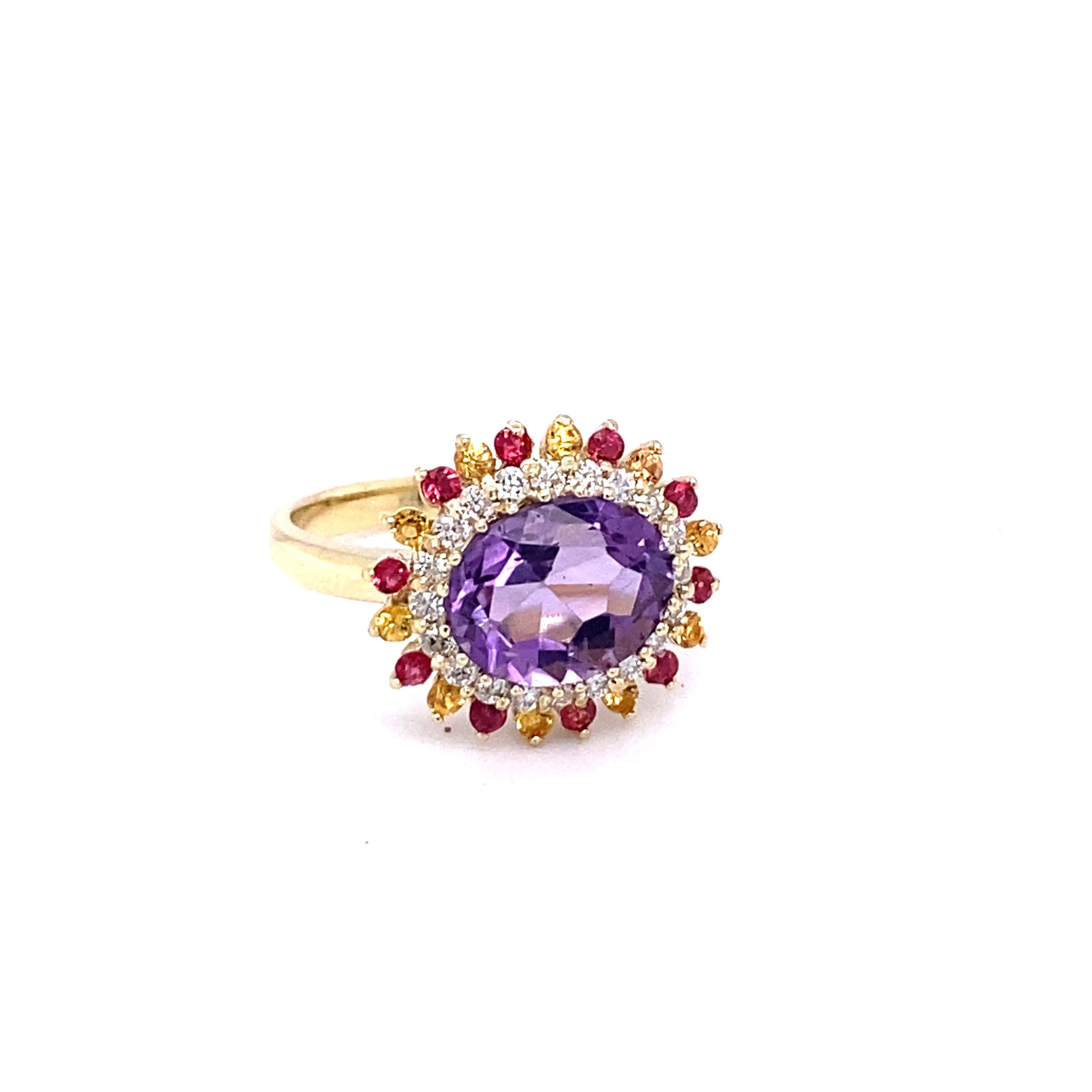 3.37 Carat Natural Amethyst Diamond Sapphire Yellow Gold Cocktail Ring

Cute and Dainty!! This ring has a bright and vivid purple Oval Cut Amethyst that weighs 2.29 Carats and is embellished with 20 Red and Yellow Sapphires that weigh 0.51 Carats as