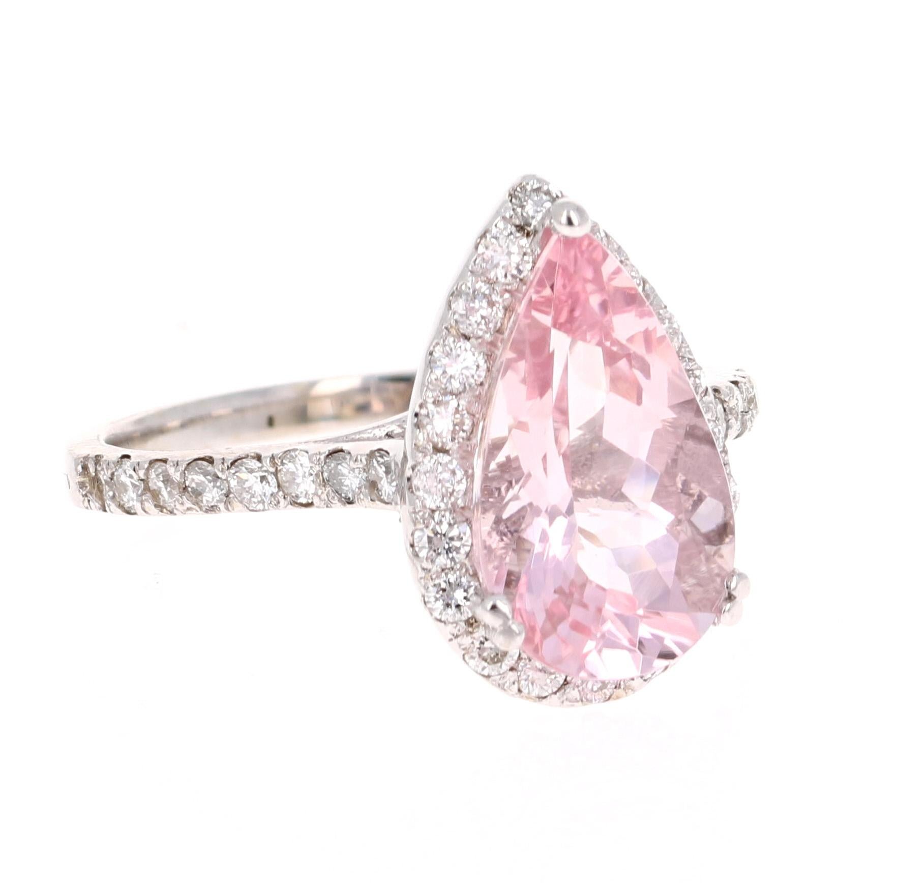 A lovely Engagement Ring Option or as an alternate to a Pink Diamond Ring! 

This gorgeous and classy Morganite and Diamond Ring has a 2.83 Carat Pear Cut Pink Morganite and has 39 Round Cut Diamonds that weigh 0.54 carats (Clarity: VS2, Color: H).