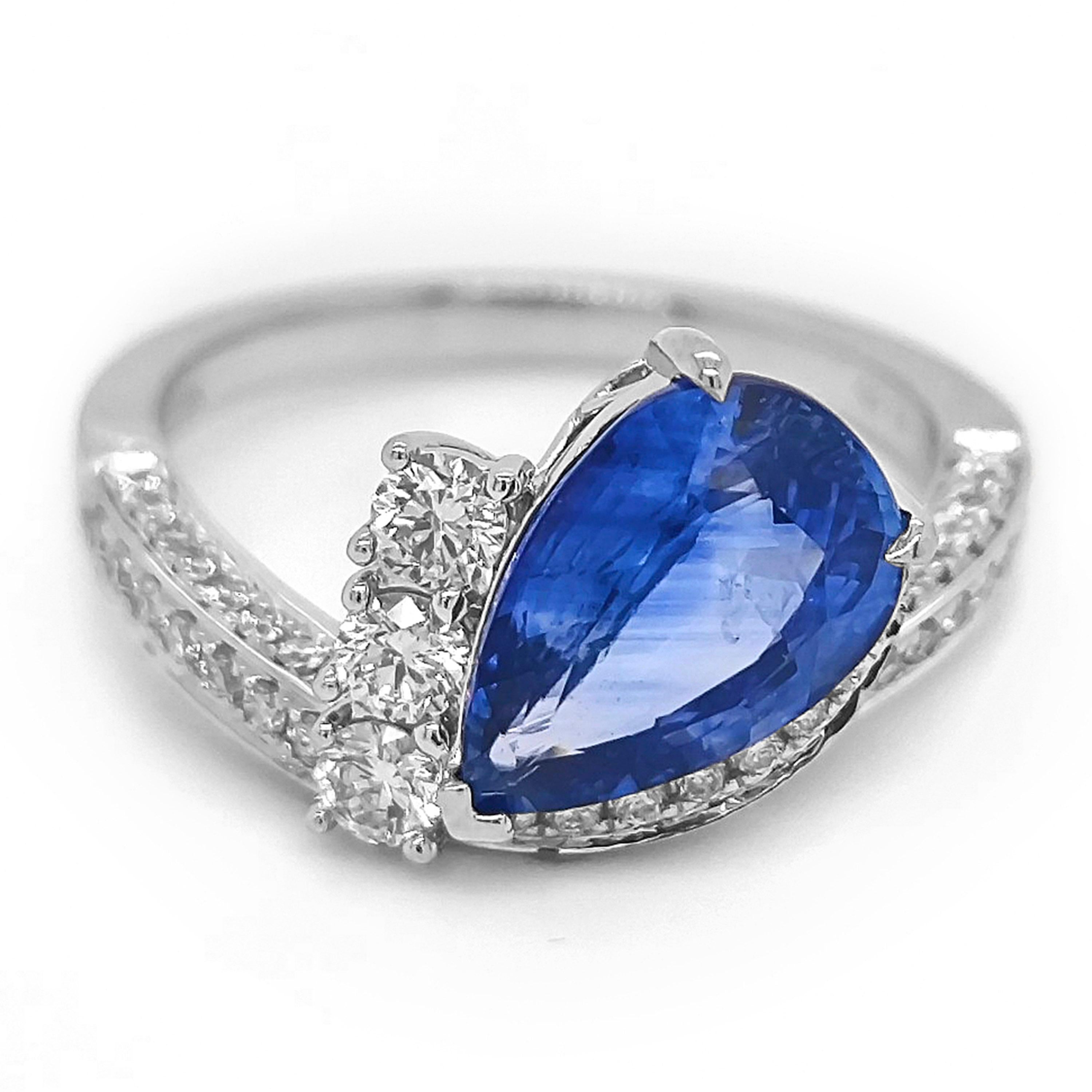 1 Sapphire Gemstone: 2.74 Carats
71 White Round Diamonds: 0.39 Carats
3 White Round Diamonds: 0.24 Carats
Metal: 18K White Gold, 4.20 Grams
