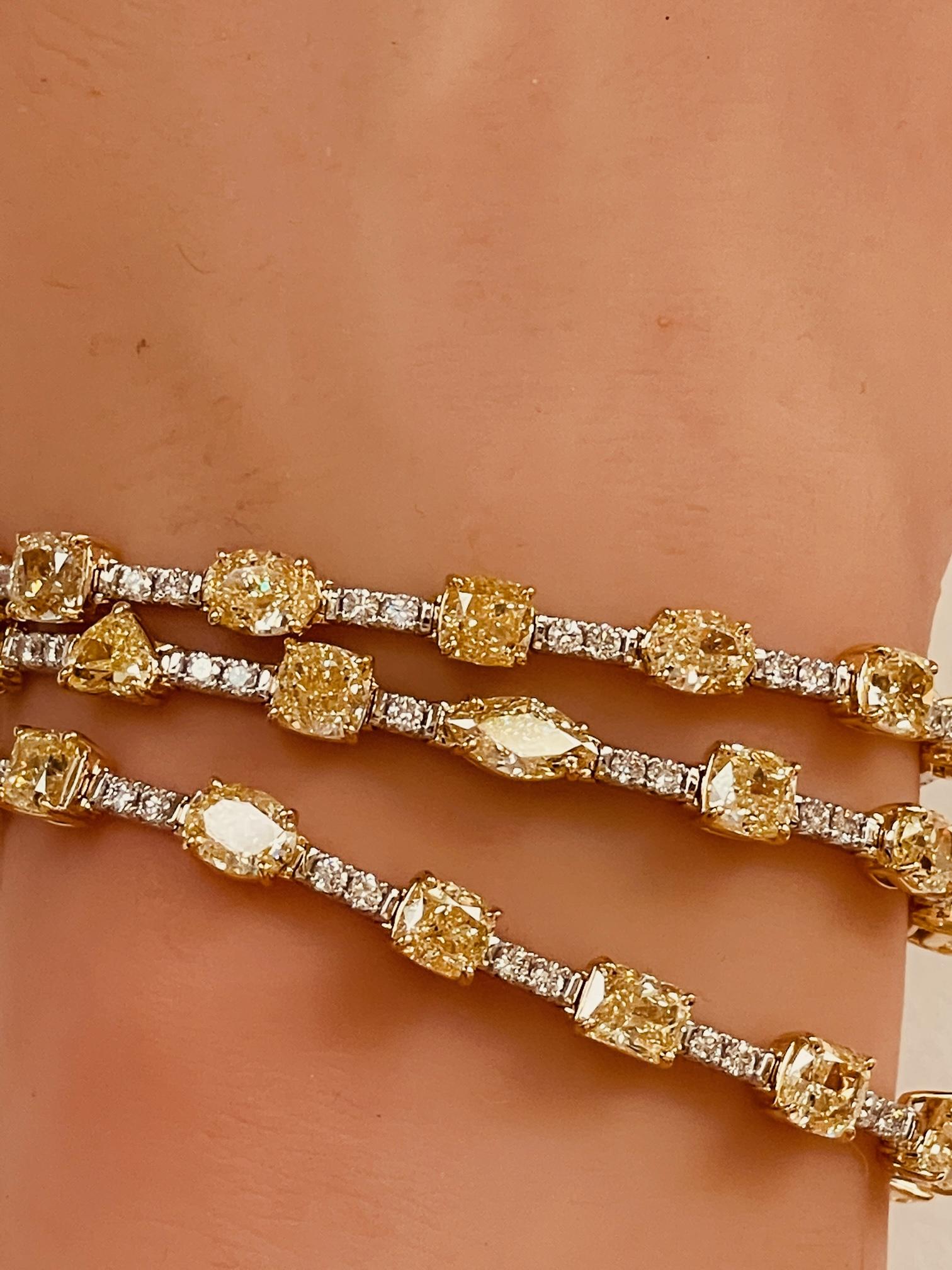 Brilliant Cut 33.70 Ctw. Three Row Fancy Shape Fancy Yellow Diamond Bracelet in 14K Gold For Sale