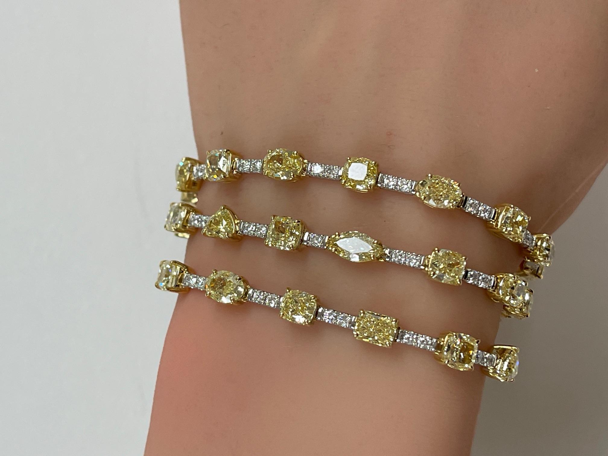 33.70 Ctw. Three Row Fancy Shape Fancy Yellow Diamond Bracelet in 14K Gold For Sale 1