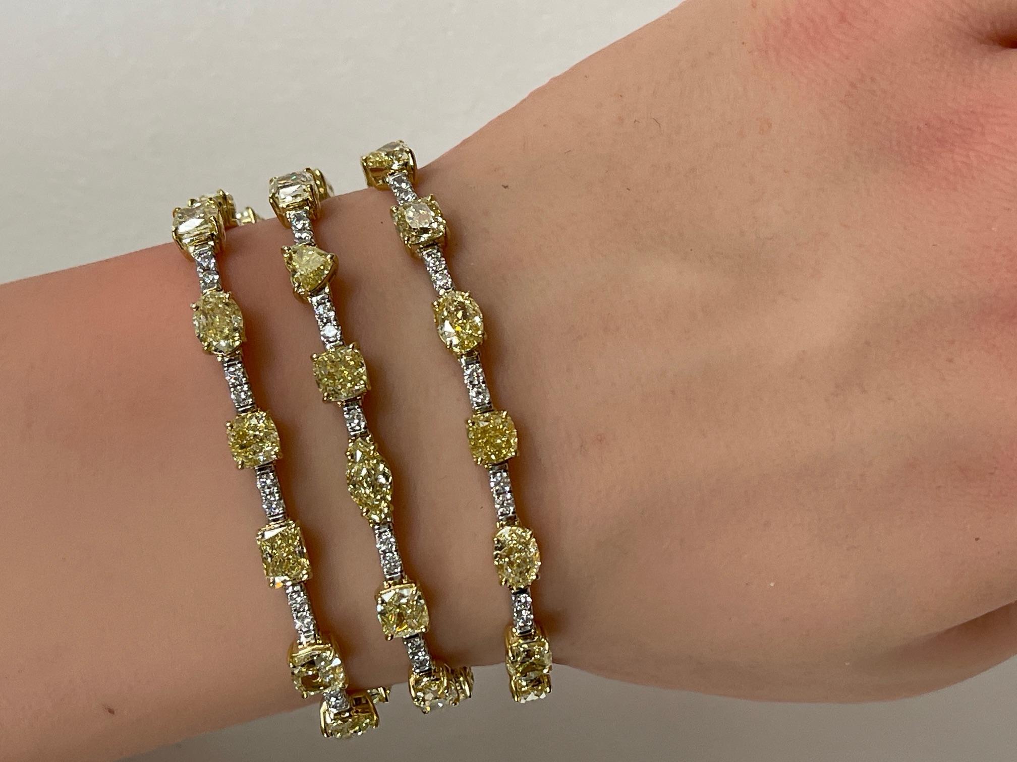 33.70 Ctw. Three Row Fancy Shape Fancy Yellow Diamond Bracelet in 14K Gold For Sale 3