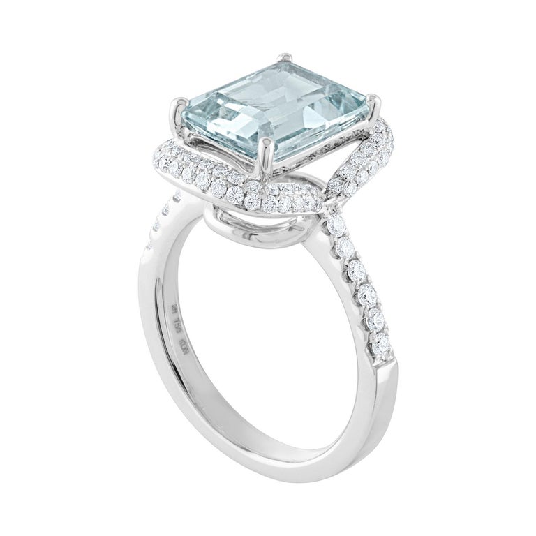 Stunning Emerald Cut Aquamarine Ring
The ring is 18K White Gold
There are 0.57 Carats in Diamonds F/G VS/SI
The center stone is 3.38 Carats Aquamarine, Step Cut Or Emerald Cut
The top of the ring measures 15.68mm x 11.17mm
The ring is size 6.5,