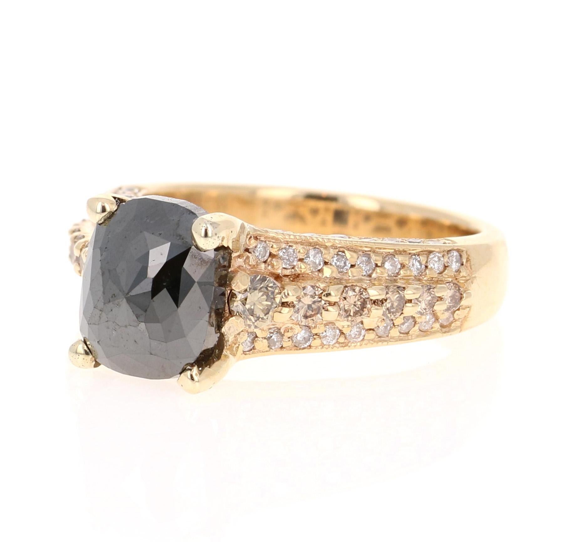 Stunning Black, White, and Brown/Champagne Diamond Cocktail or Engagement Ring that is a nothing but a Statement! 

The Cushion/Oval Cut Black Diamond is 2.51 Carats and is surrounded by 12 Champagne Colored Round Cut Diamonds that weigh 0.37