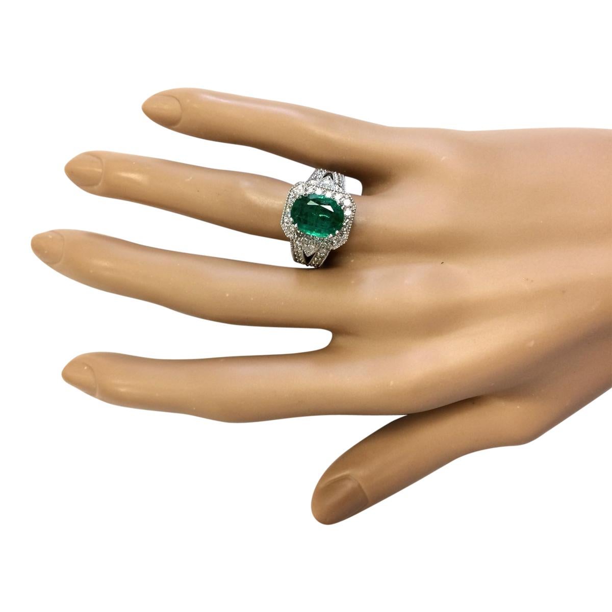 Oval Cut Emerald Diamond Ring In 14 Karat White Gold  For Sale