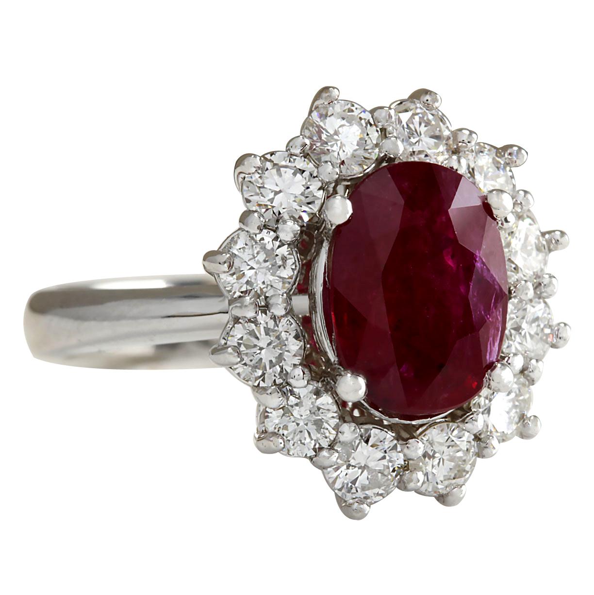Stamped: 14K White Gold
Total Ring Weight: 5.0 Grams
Total Natural Ruby Weight is 2.28 Carat (Measures: 9.00x7.00 mm)
Color: Red
Total Natural Diamond Weight is 1.10 Carat
Color: F-G, Clarity: VS2-SI1
Face Measures: 16.30x14.50 mm
Sku: [702852W]
