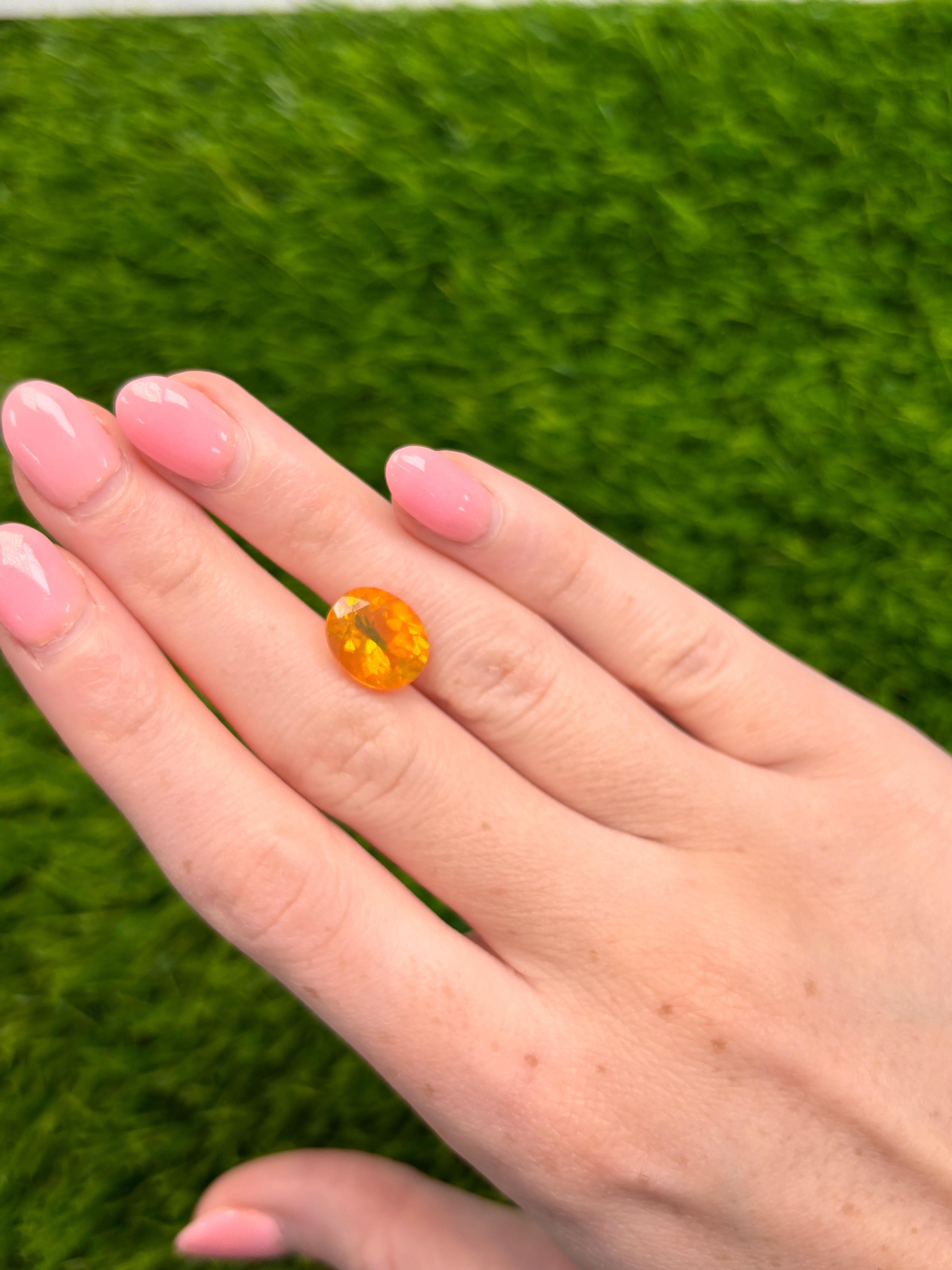 Oval Cut 3.38 Carat Oval-Cut Natural Golden Orange Fire Opal Loose Gemstone For Sale