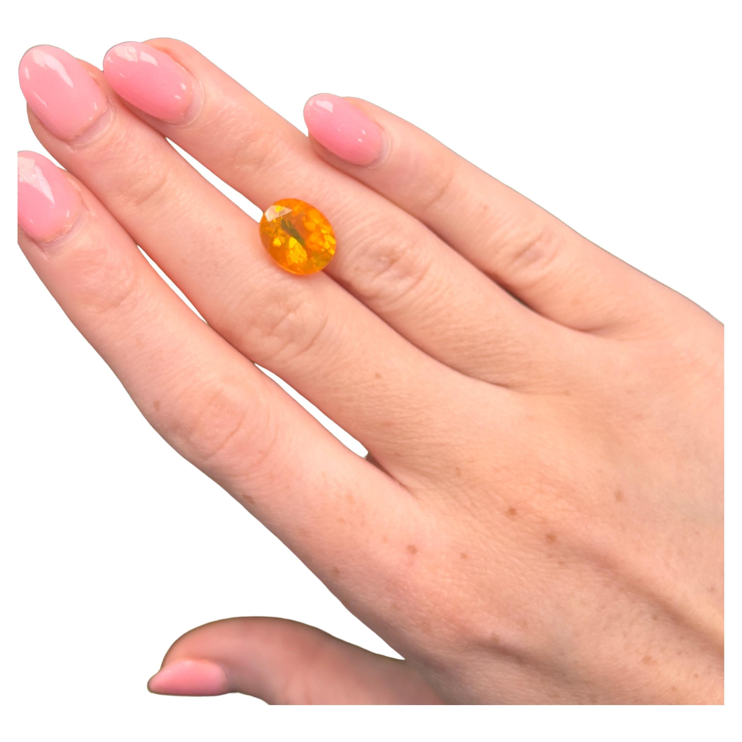 3.38 Carat Oval-Cut Natural Golden Orange Fire Opal Loose Gemstone For Sale